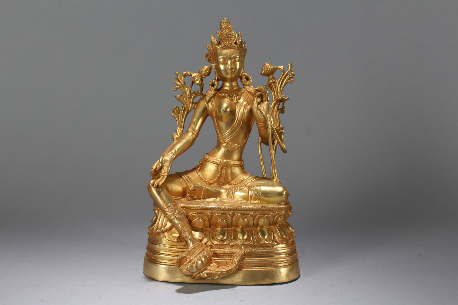 A Chinese Religious Vividly-detailed Gilt Fortune Buddha Statue: A Chinese Religious Vividly-detailed Gilt Fortune Buddha Statue. Height : 9.75 (inch). Width : 6.15 (inch). Length : 5 (inch).