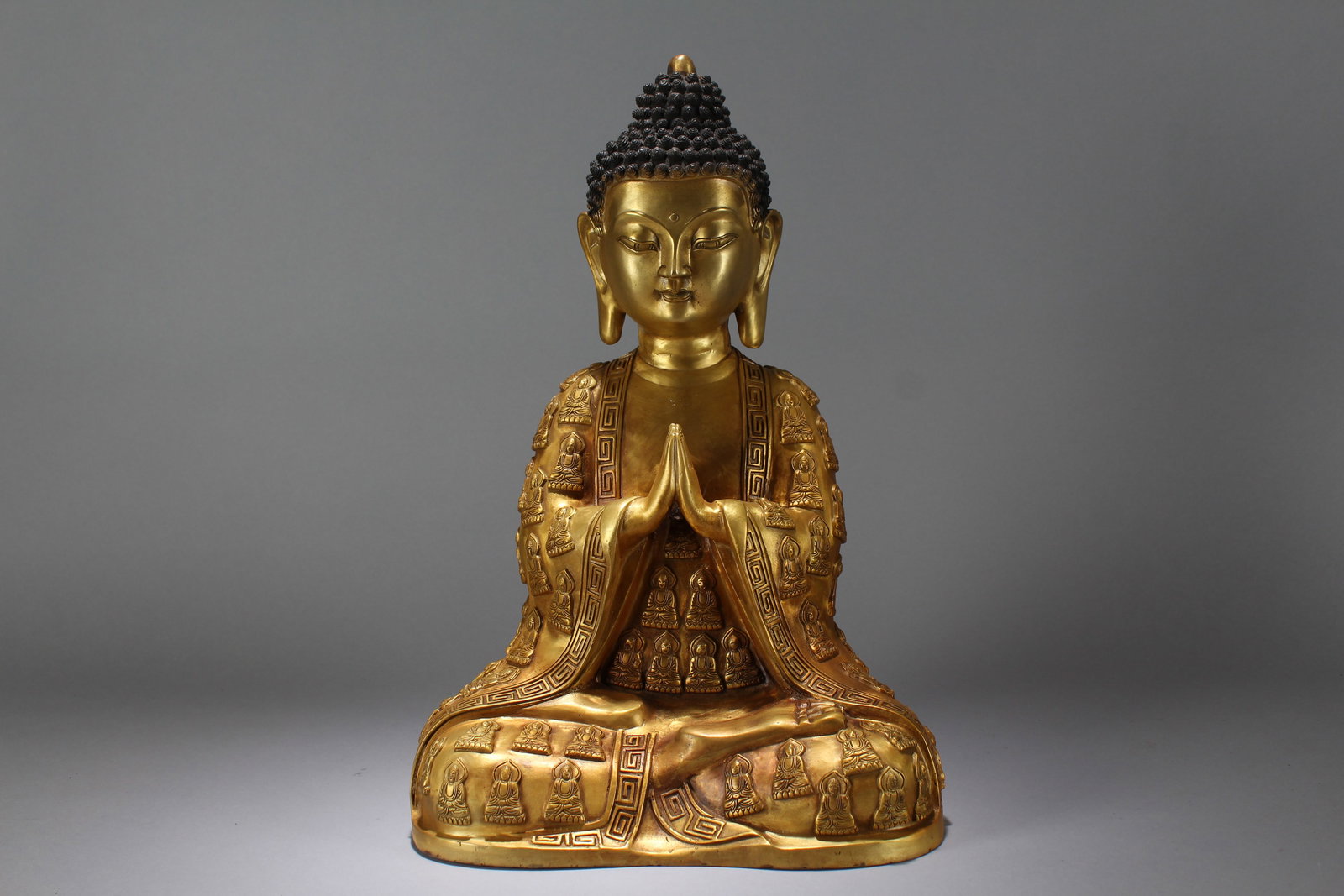 A Chinese Gilt Religious Fortune Massive Buddha Statue: A Chinese Gilt Religious Fortune Massive Buddha Statue. Height: 16.5 (inch). Width: 11 (inch). Length: 7 (inch).