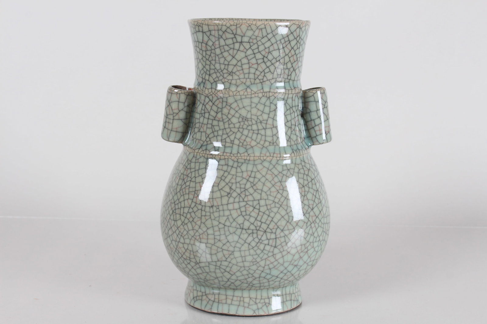 A Chinese Duo-handled Crack-glaze Porcelain Fortune Vase: A Chinese Duo-handled Crack-glaze Porcelain Fortune Vase . Height: 9 (inch).