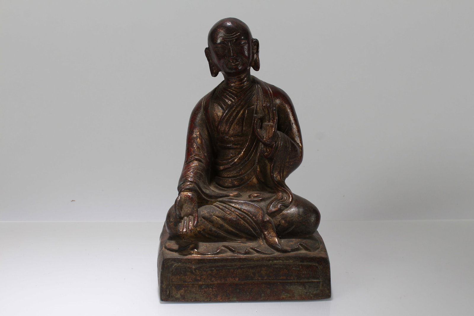 A Chinese Religious Fortune Buddha Statue: A Chinese Religious Fortune Buddha Statue. Height: 9.5 (inch). Length: 6 (inch). Width: 4.5 (inch).