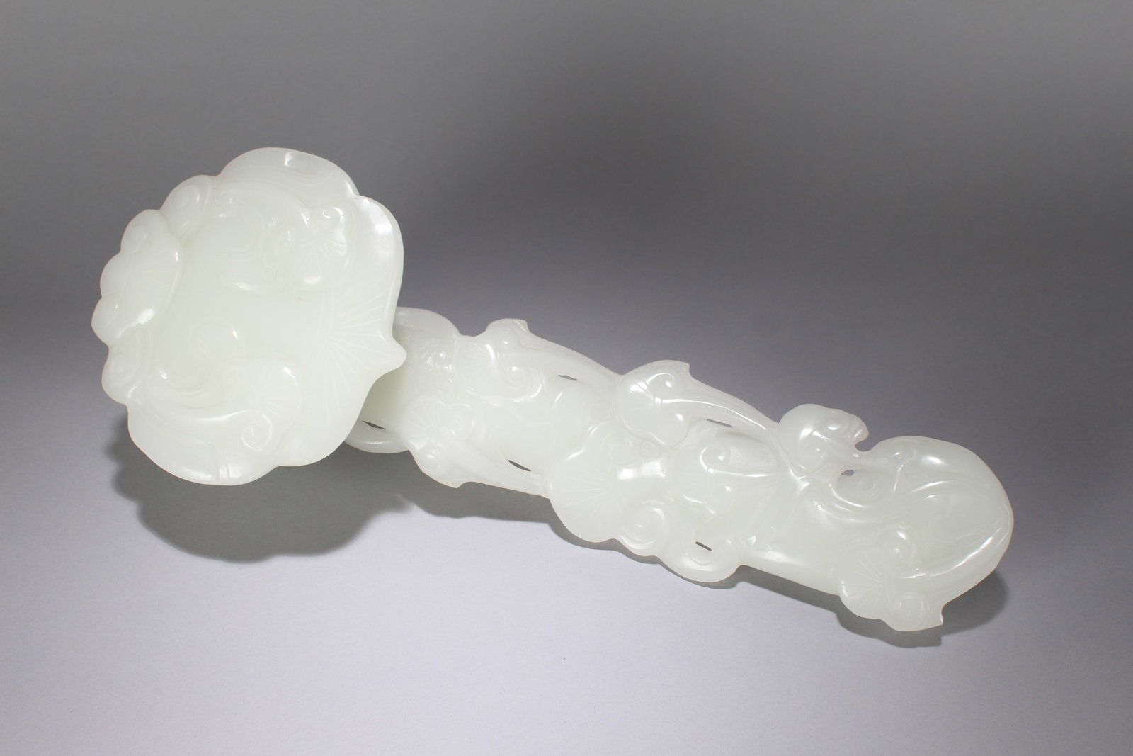 A Chinese Vividly-detailed Jade-craving Fortune Ruyi: A Chinese Vividly-detailed Jade-craving Fortune Ruyi. Height: 14 (inch). Width: 8 (inch)