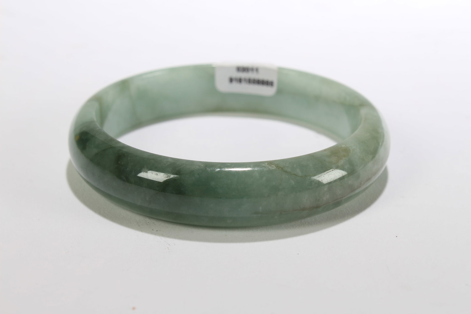 A Chinese Bangle: A Chinese Bangle. Opening Diameter: 2.75 (inch).