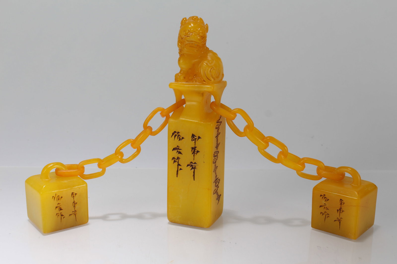 A Chinese Chained-fortune Myth-beast Religious Soapstone Seals: A Chinese Chained-fortune Myth-beast Religious Soapstone Seals. Height: 6 (inch). Length: 10 (inch). Width: 1.5 (inch).