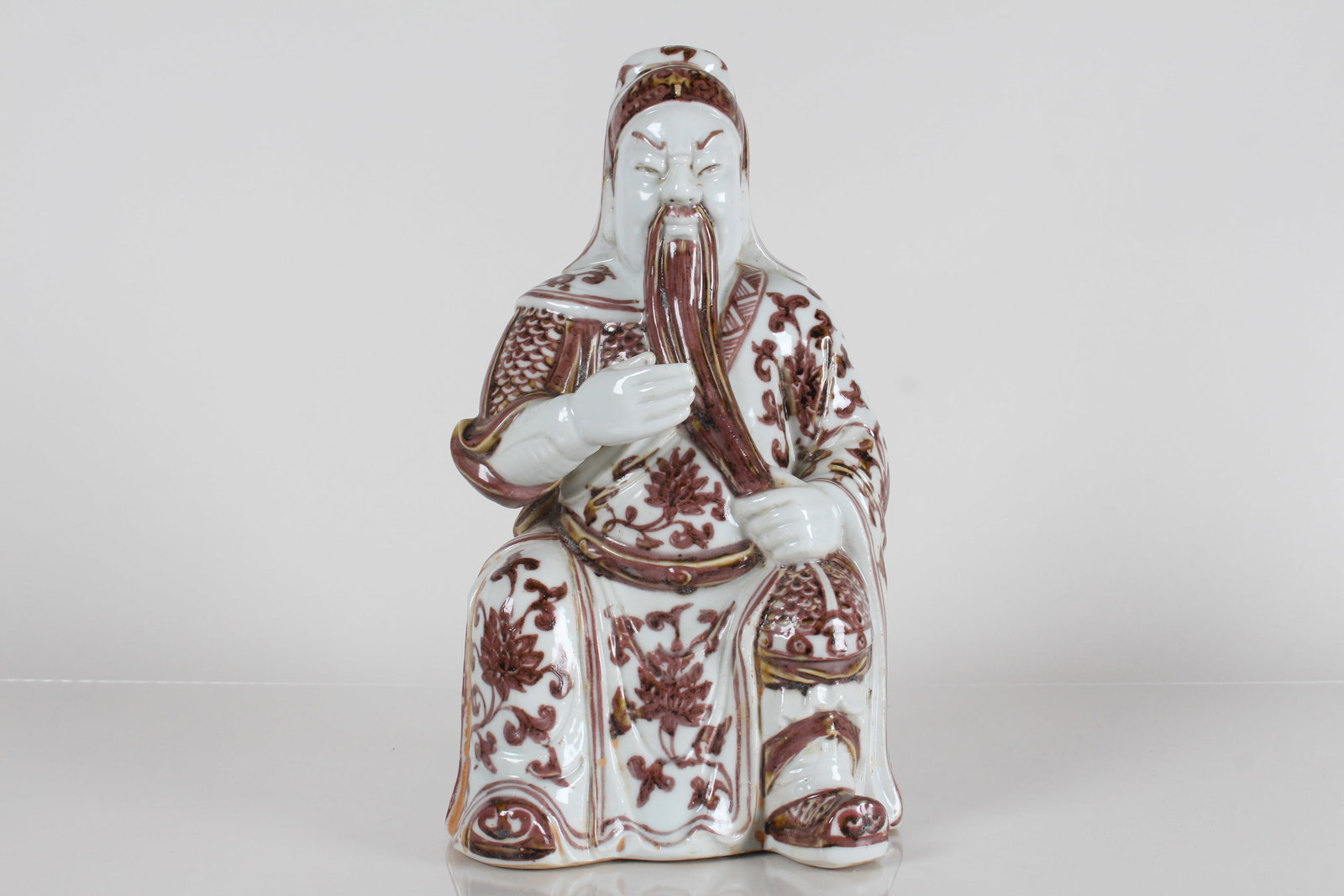 A Chinese Guangong Porcelain Fortune Statue: A Chinese Guangong Porcelain Fortune Statue . Height: 10.75 (inch).