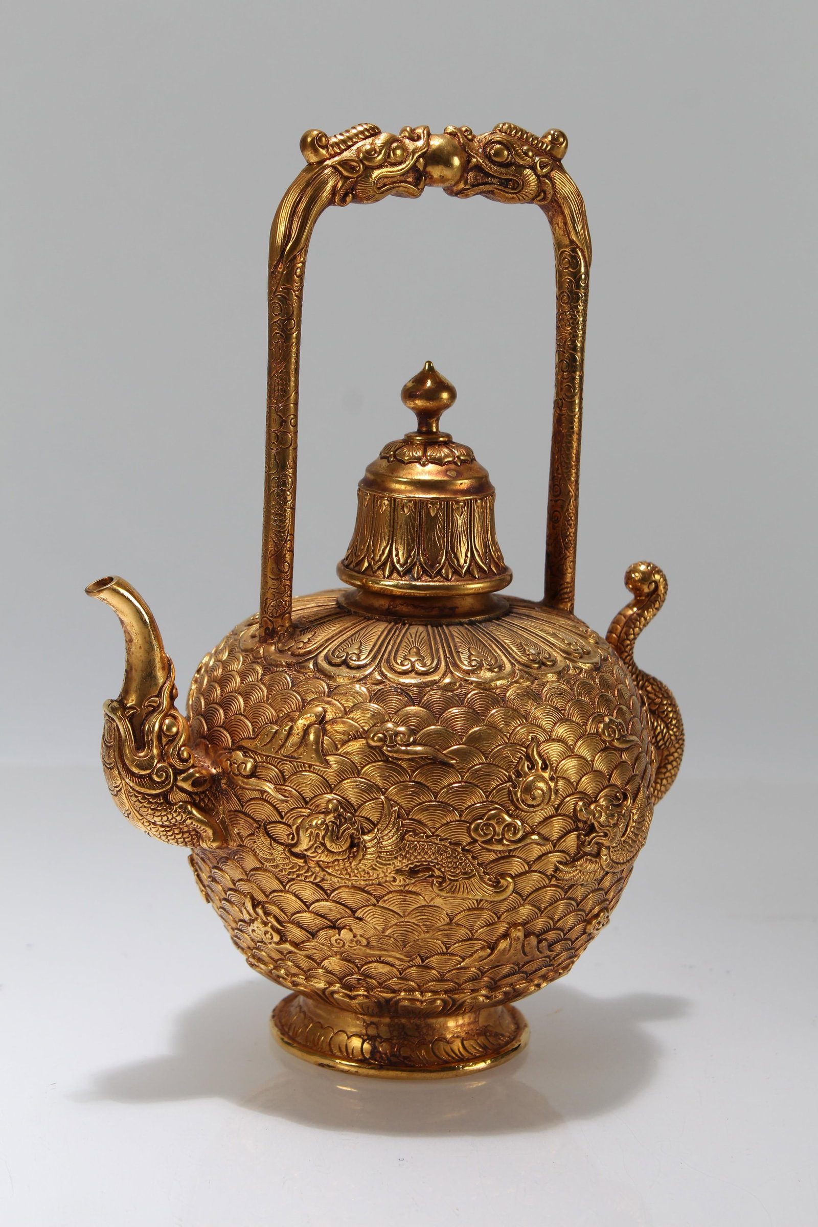A Chinese High-handled Fortune Gilt Tea Pot: A Chinese High-handled Fortune Gilt Tea Pot. Height: 7 (inch). Length: 5.5 (inch).