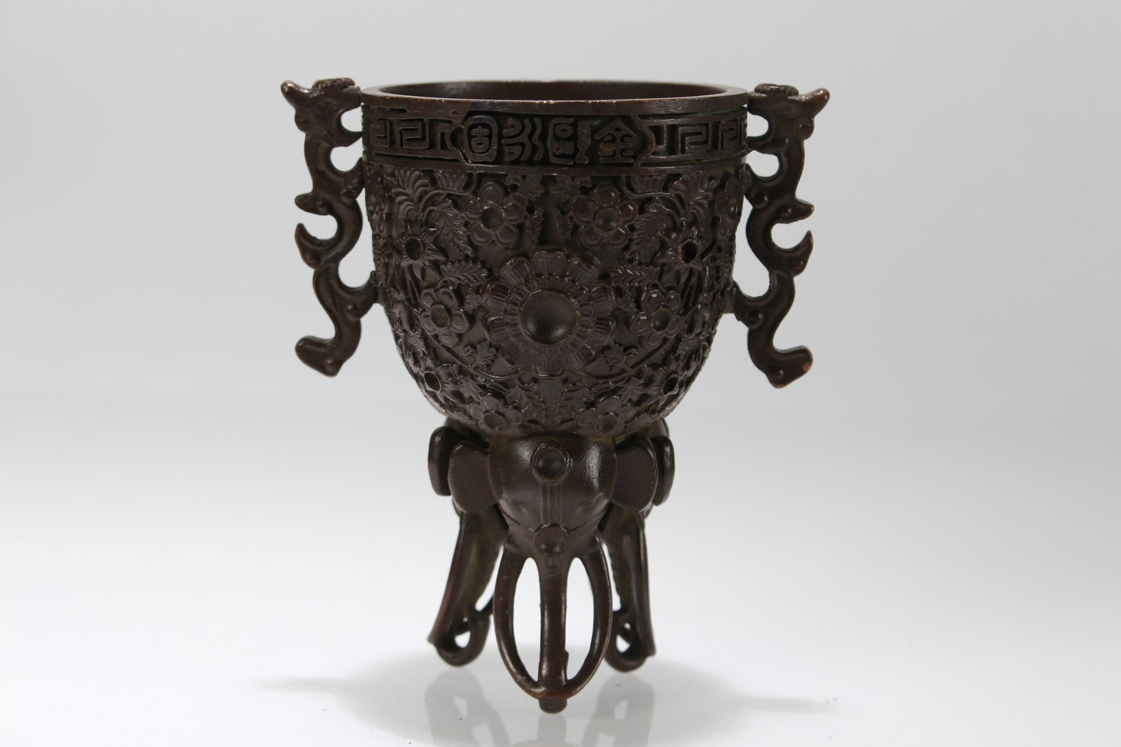 A Chinese Duo-handling Tri-podded Fortune Censer: A Chinese Duo-handling Tri-podded Fortune Censer. Height: 4 (inch). Opening Diameter: 3.5 (inch).