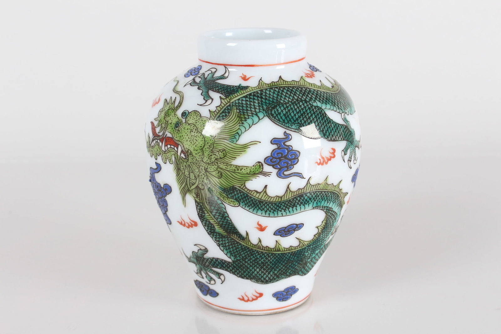 A Chinese Dragon-decorating Porcelain Fortune Vase: A Chinese Dragon-decorating Porcelain Fortune Vase . Height: 5.25 (inch).