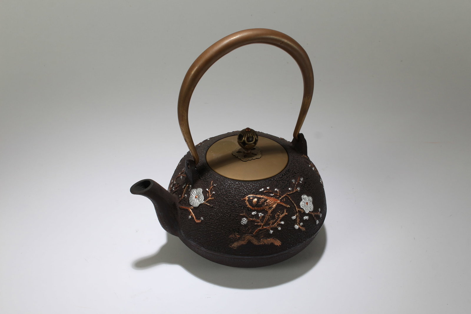 A Chinese Lidded Fortune Metal Tea Pot: A Chinese Lidded Fortune Metal Tea Pot. Height: 9 (inch). Length: 7.5 (inch). Width: 6 (inch).