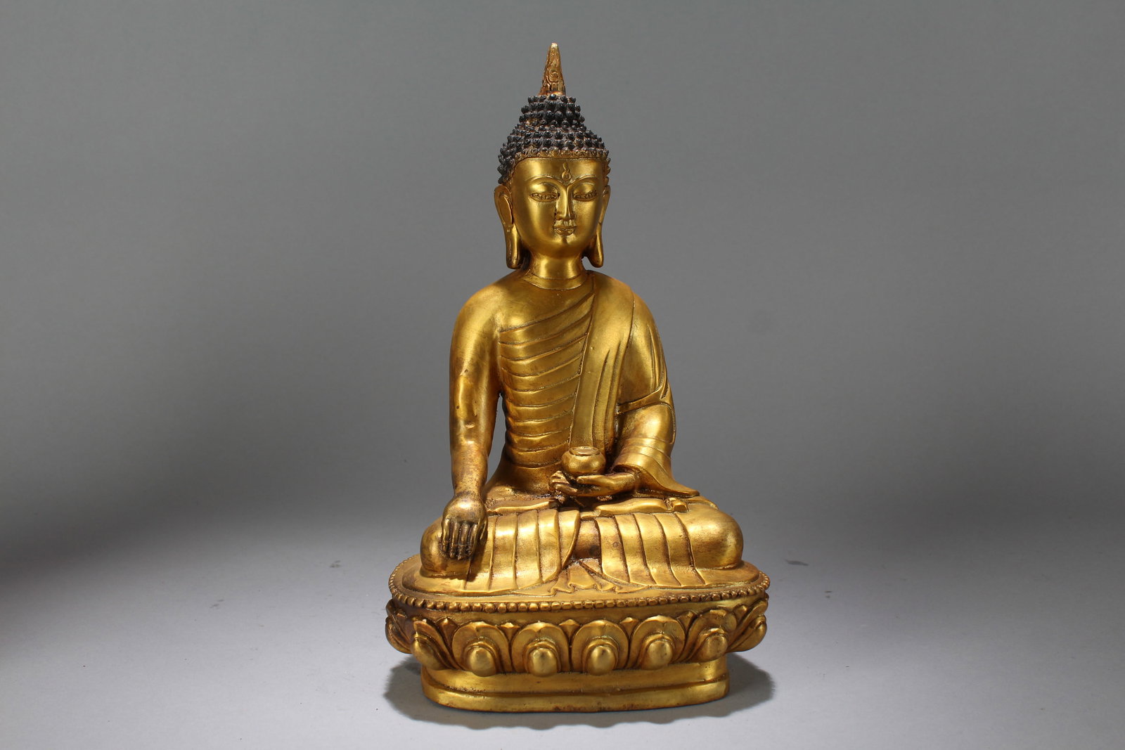 A Chinese Religious Fortune Gilt Buddha Statue: A Chinese Religious Fortune Gilt Buddha Statue. Height: 12 (inch). Width: 6.5 (inch). Length: 5 (inch).