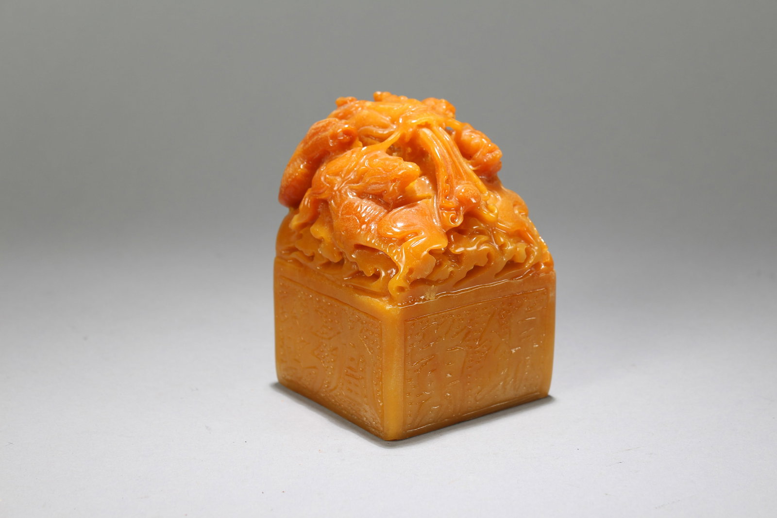 A Chinese Square-based Fortune Soapstone Seal: A Chinese Square-based Fortune Soapstone Seal. Height: 4.5 (inch). Length: 3 (inch). Width: 3 (inch).