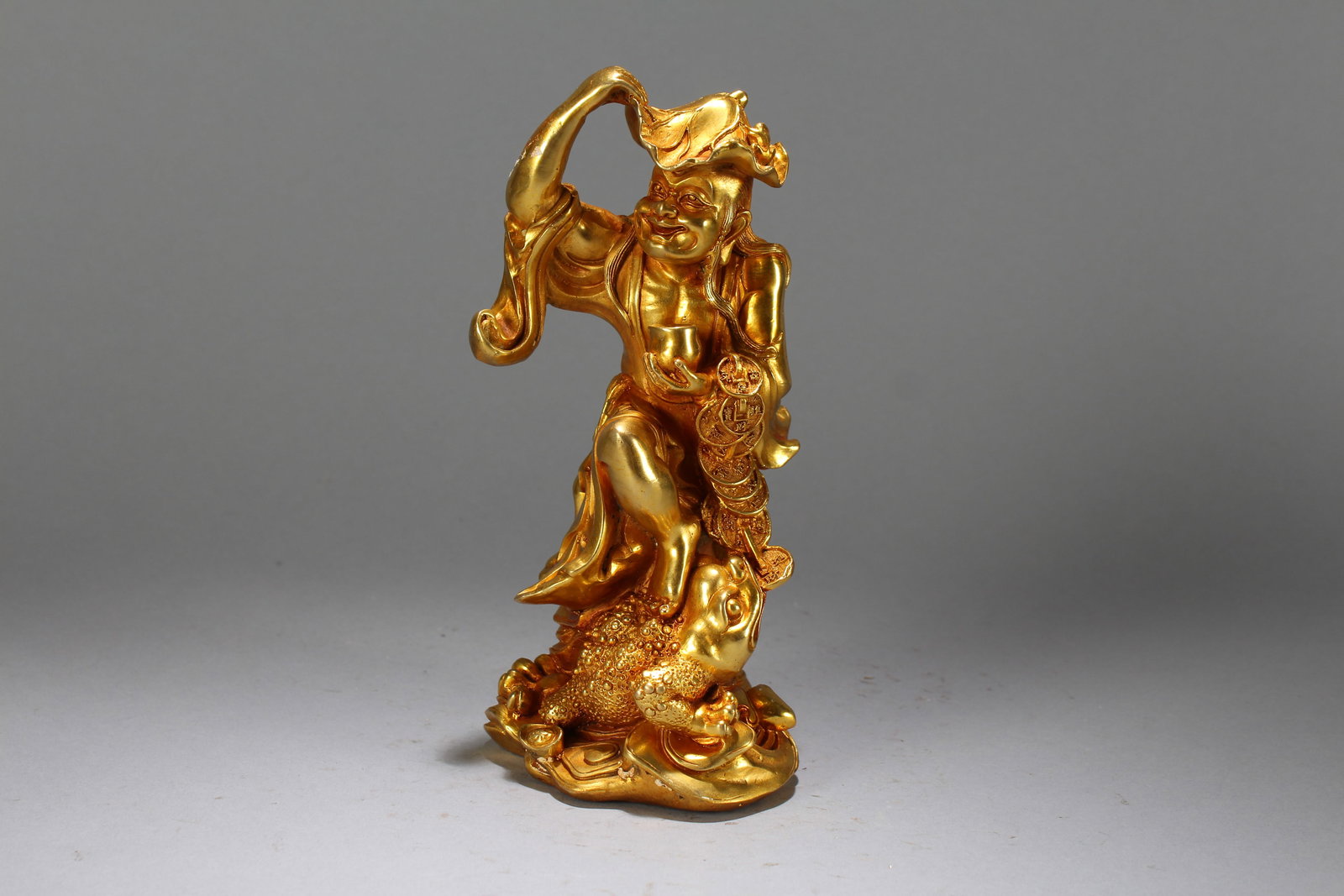 A Chinese Vividly-detailed Anicent-framing Gilt Buddha Statue: A Chinese Vividly-detailed Anicent-framing Gilt Buddha Statue. Height : 8 (inch). Width : 3.75 (inch). Length : 4 (inch).