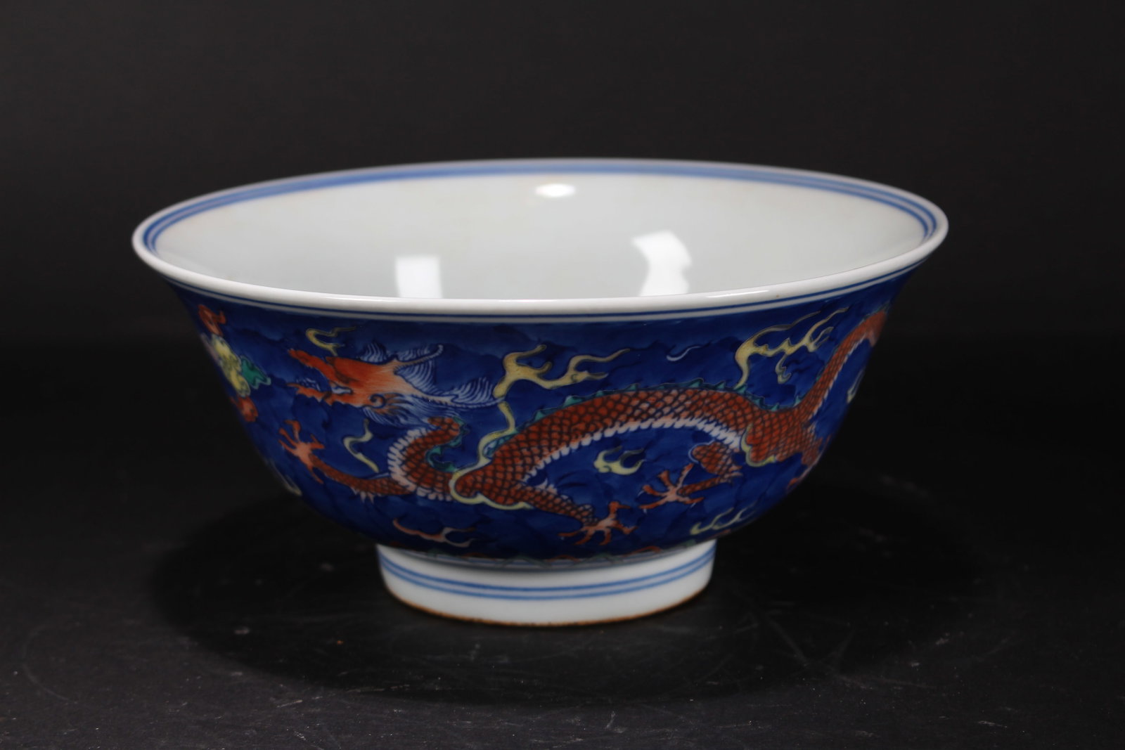 A Chinese Dragon-decorating Porcelain Fortune Bowl: A Chinese Dragon-decorating Porcelain Fortune Bowl. Height: 3 (inch). Opening Diameter: 7.25 (inch).