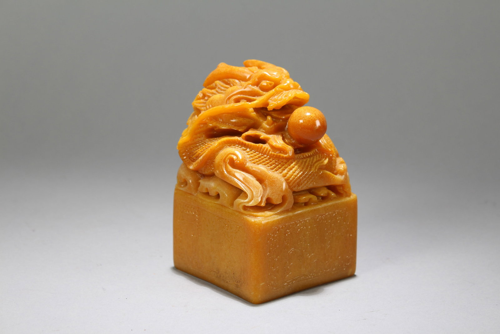 A Chinese Square-based Fortune Soapstone Seal: A Chinese Square-based Fortune Soapstone Seal. Height: 5 (inch). Length: 3 (inch). Width: 3 (inch).
