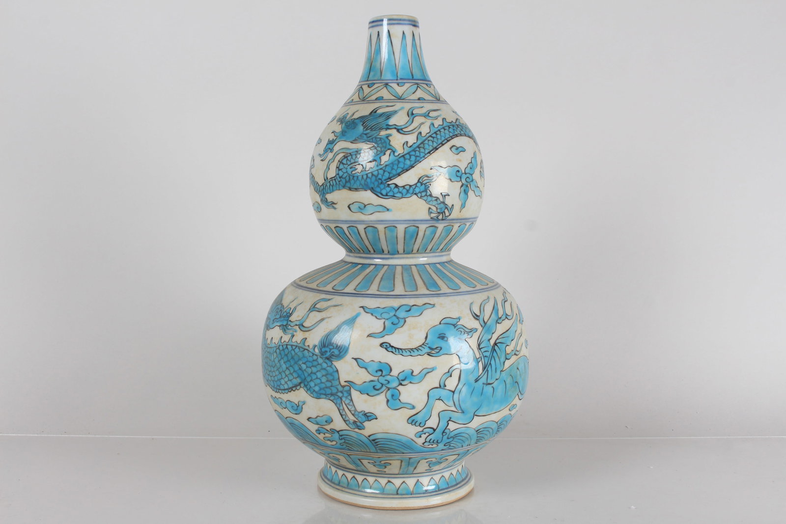 A Chinese Ancient-framing Dragon-decorating Porcelain Fortune Vase: A Chinese Ancient-framing Dragon-decorating Porcelain Fortune Vase . Height: 15 (inch).