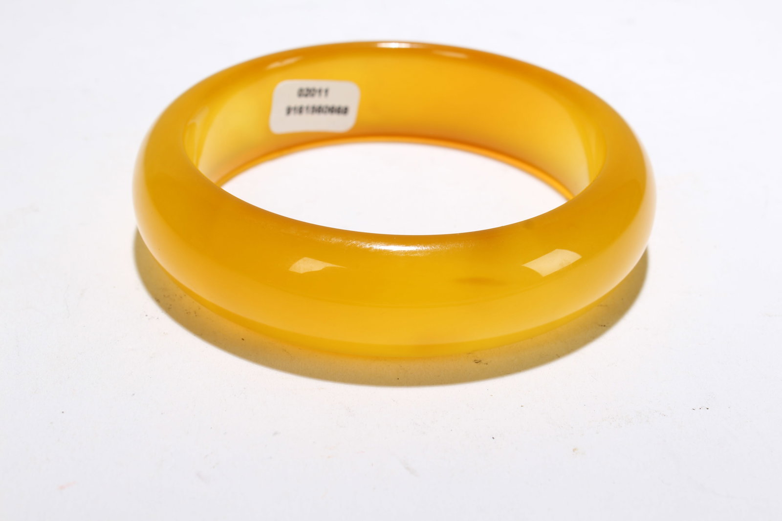A Chinese Bangle Display: A Chinese Bangle Display . Opening Diameter: 3 (inch).