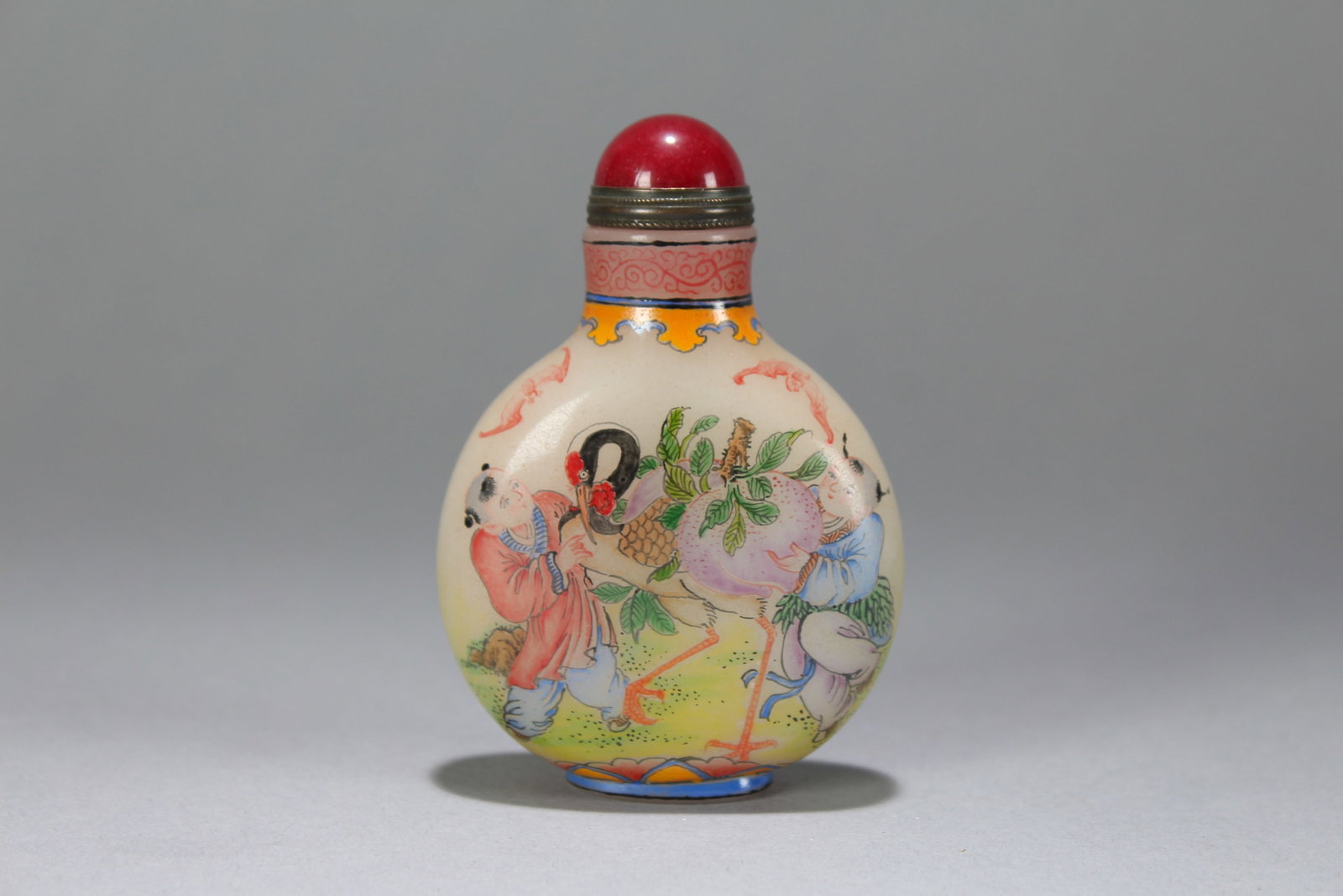 A Chinese Story-telling Joyful-kid Lidded Snuff-bottle: A Chinese Story-telling Joyful-kid Lidded Snuff-bottle. Height : 3.25 (inch). Width : 2 (inch). Length : 1 (inch).