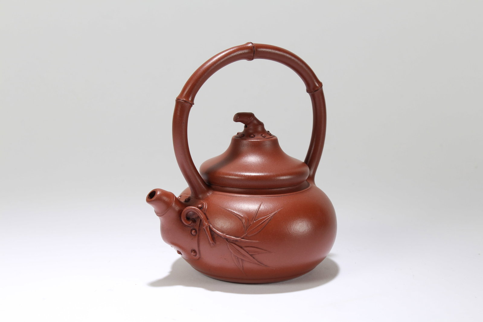 A Chinese Bamboo-fortune High-handled Fortune Tea Pot: A Chinese Bamboo-fortune High-handled Fortune Tea Pot. Height: 6 (inch). Length: 5 (inch).