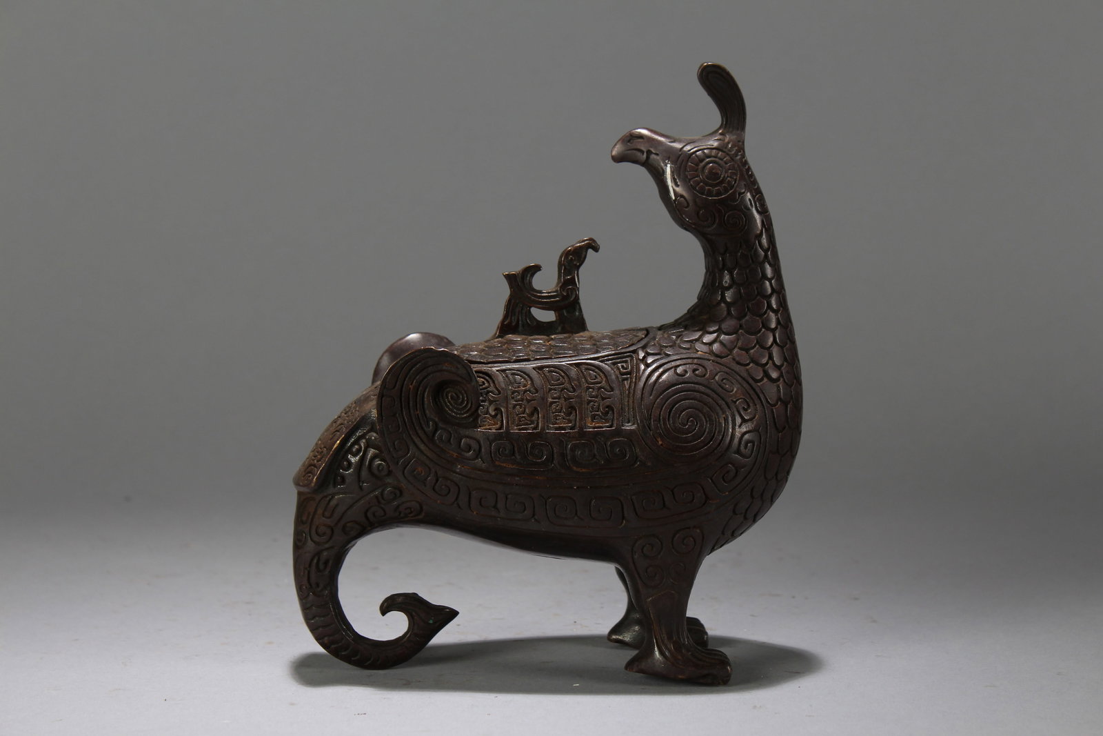 A Chinese Lidded Myth-beast Anicent-framing Fortune Statue: A Chinese Lidded Myth-beast Anicent-framing Fortune Statue. Height : 7.25 (inch). Width : 6 (inch). Length : 3.1 (inch).