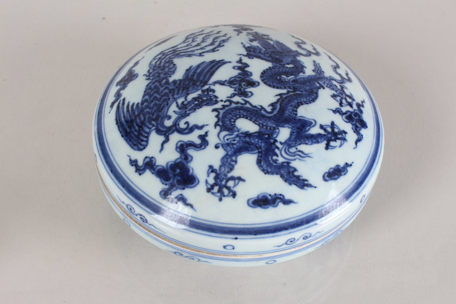 A Chinese Lidded Dragon-decorating Porcelain Fortune Dishes: A Chinese Lidded Dragon-decorating Porcelain Fortune Dishes. Height: 3.25 (inch). Opening Diame6ter: .75 (inch).