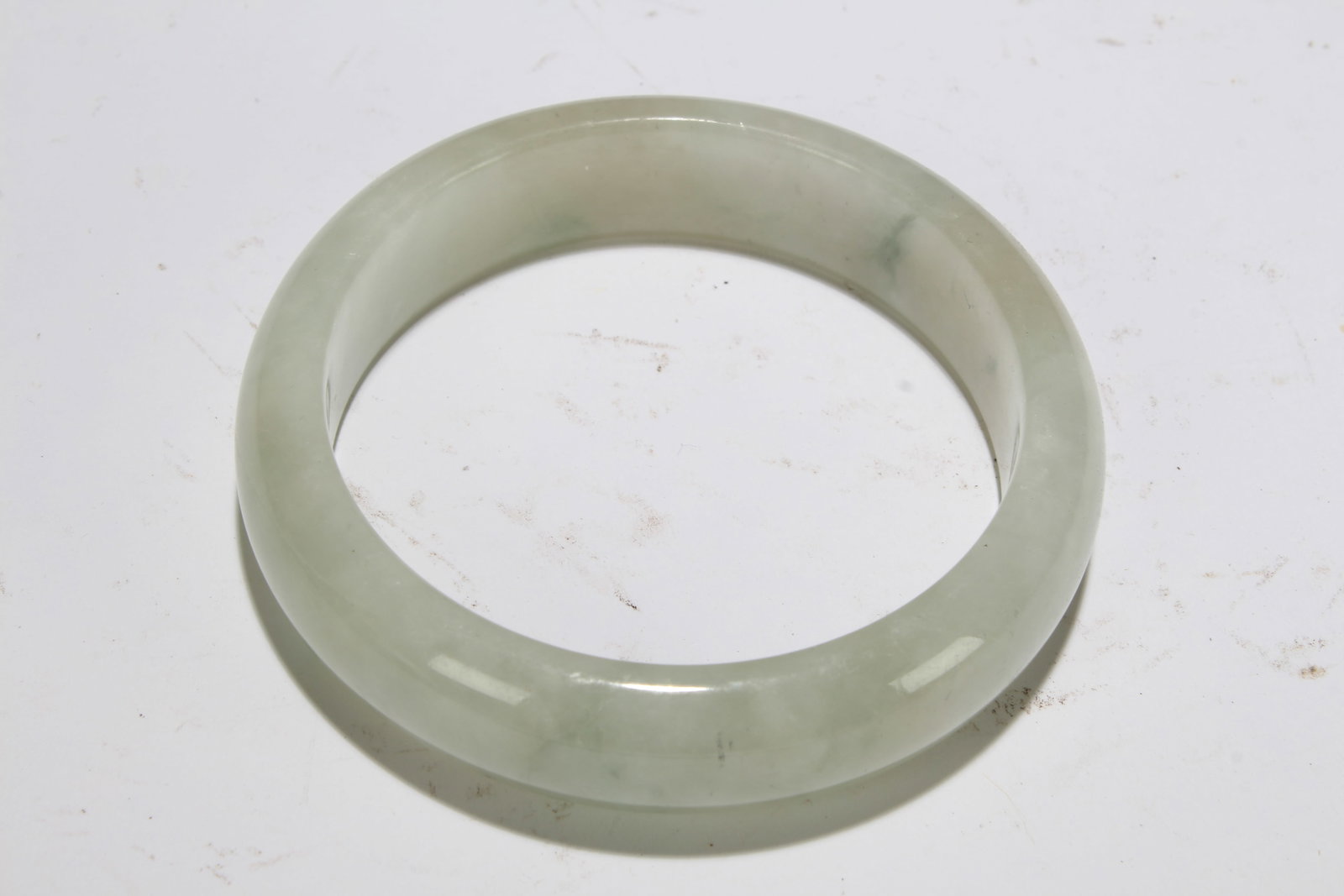 A Chinese Bangle: A Chinese Bangle. Opening Diameter: 2.75 (inch).