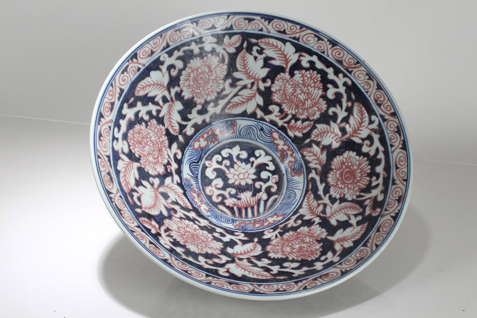 A Chinese Flower-blossom Porcelain Fortune Bowl: A Chinese Flower-blossom Porcelain Fortune Bowl. Height: 5.25 (inch). Opening Diameter: 16 (inch).