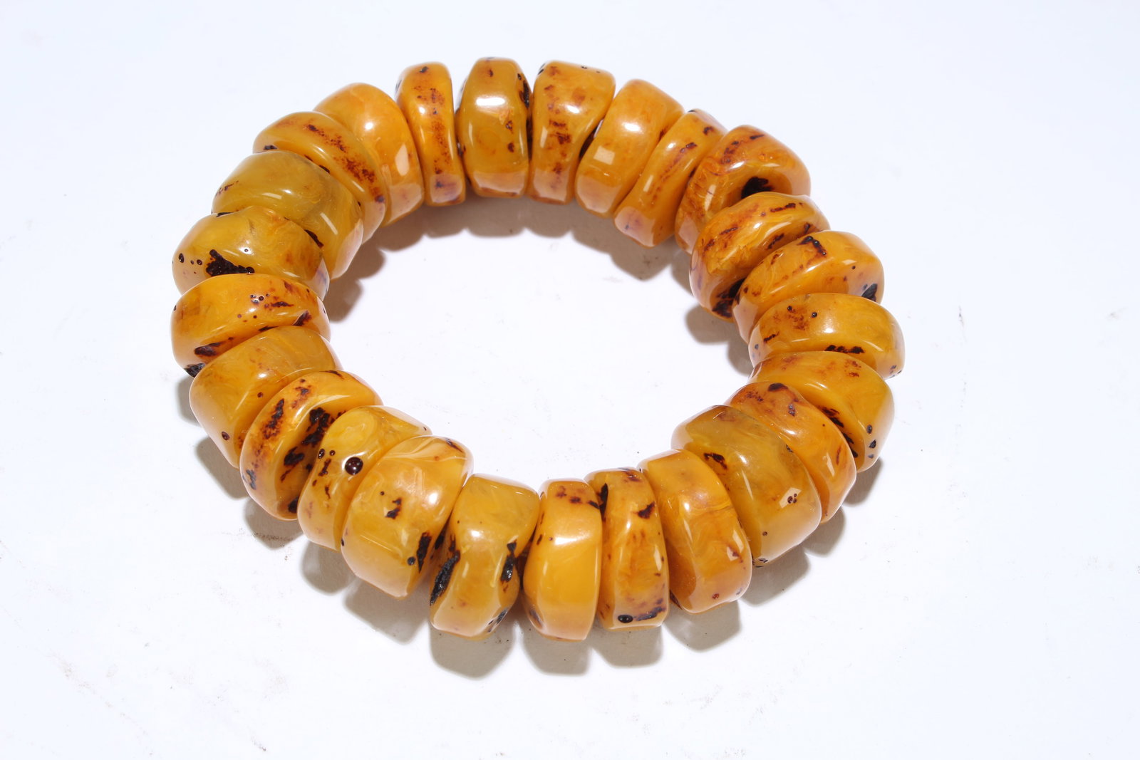 A Chinese Bracelet Display: A Chinese Bracelet Display . Length: 0.75 per bead. (inch).