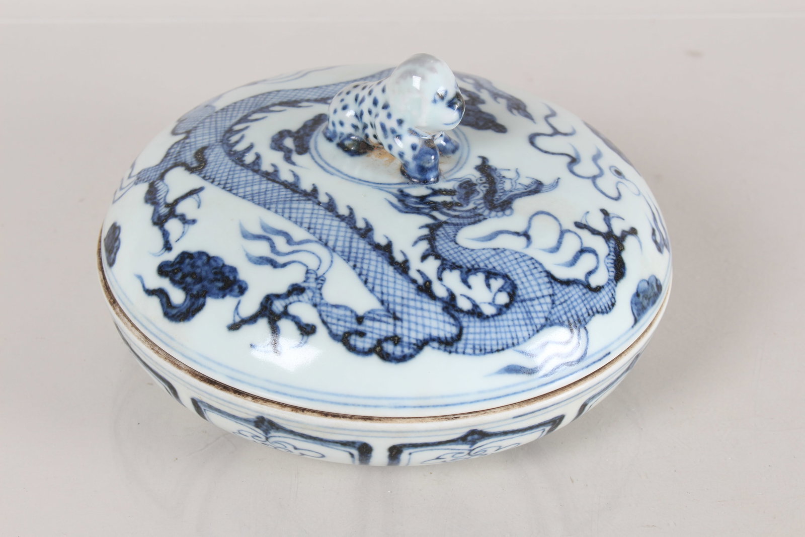 A Chinese Lidded Blue and White Porcelain Dishes: A Chinese Lidded Blue and White Porcelain Dishes. Height: 4.25 (inch). Opening 6Diameter: .75 (inch).