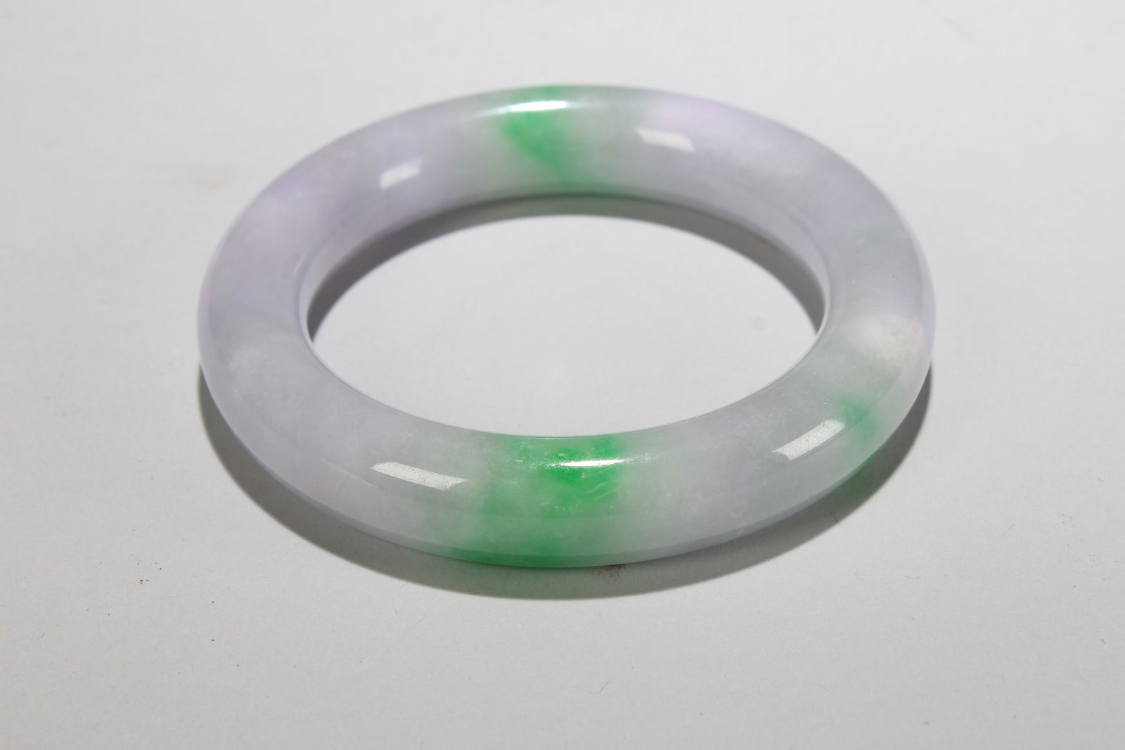 A Chinese Fortune Bangle: A Chinese Fortune Bangle. Opening Diameter: 3.25 (inch).