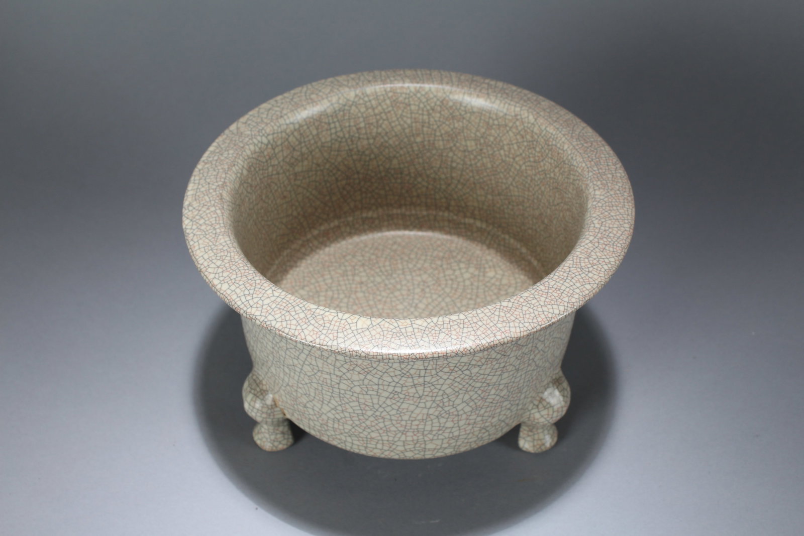 A Chinese Tri-podded Crack-fortune Porcelain Fortune Censer: A Chinese Tri-podded Crack-fortune Porcelain Fortune Censer. Height: 5 (inch). Width: 8.5 (inch).