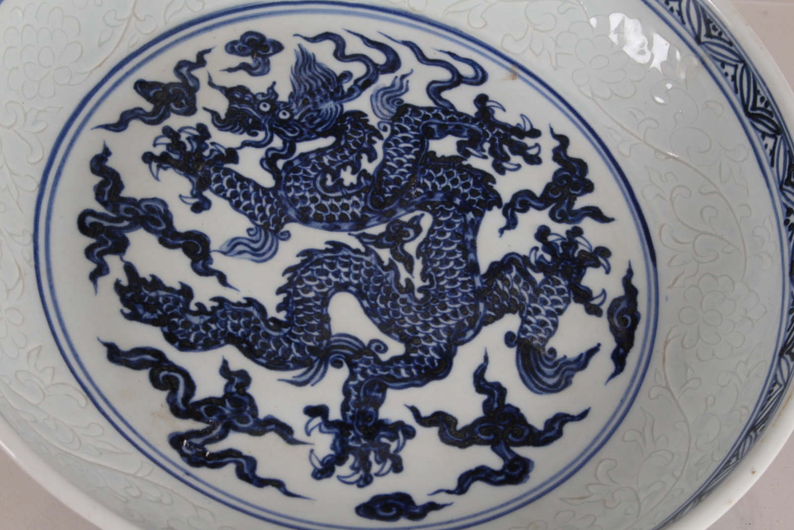 A Chinese Dragon-decorating Blue and White Porcelain Fortune Plate: A Chinese Dragon-decorating Blue and White Porcelain Fortune Plate. Height: 2.5 (inch). Opening Diameter: 11 (inch).