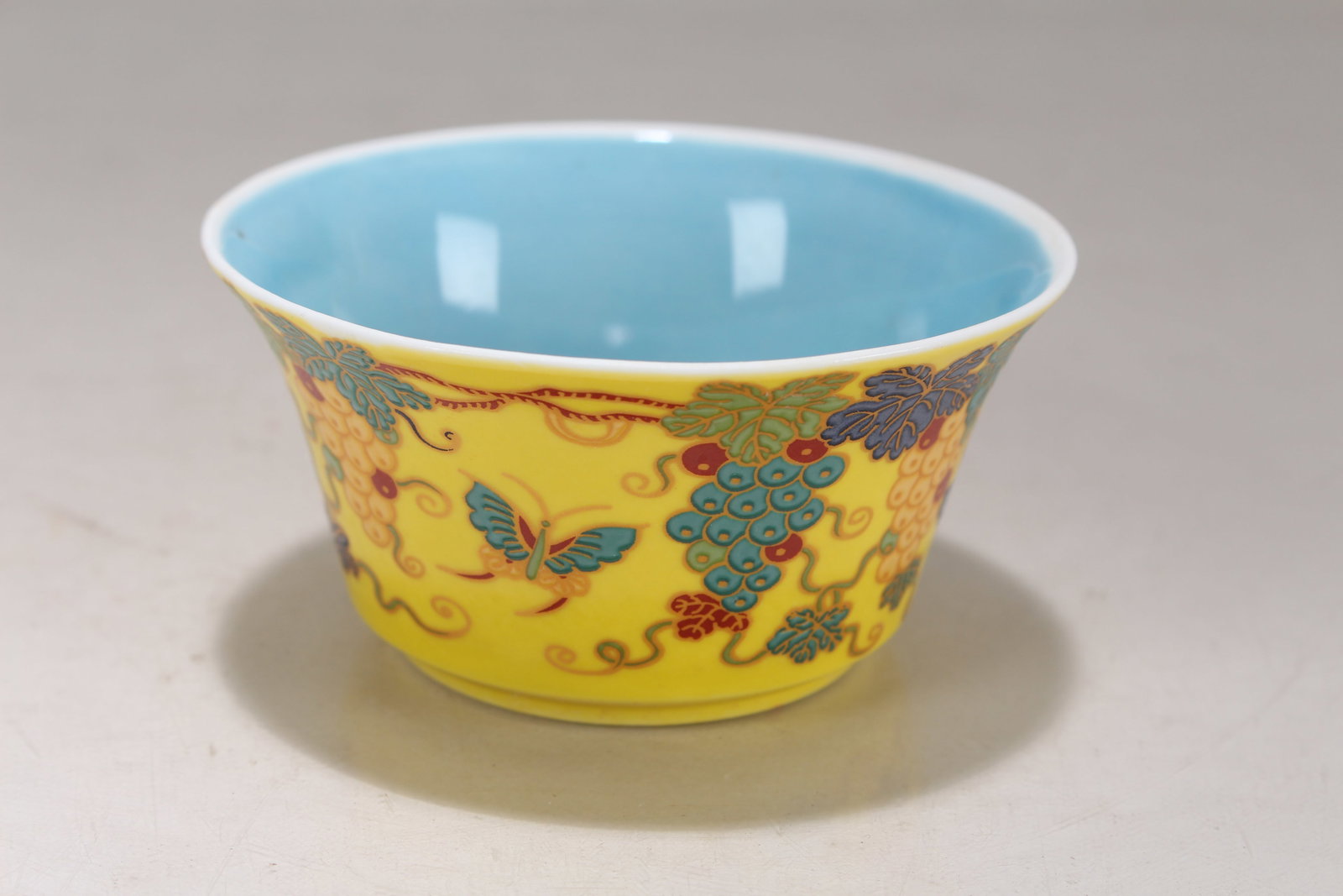 A Chinese Circular Ancient-framing Porcelain Fortune Cup: A Chinese Circular Ancient-framing Porcelain Fortune Cup. Height: 1.5 (inch). Opening Diameter: 3.25 (inch).