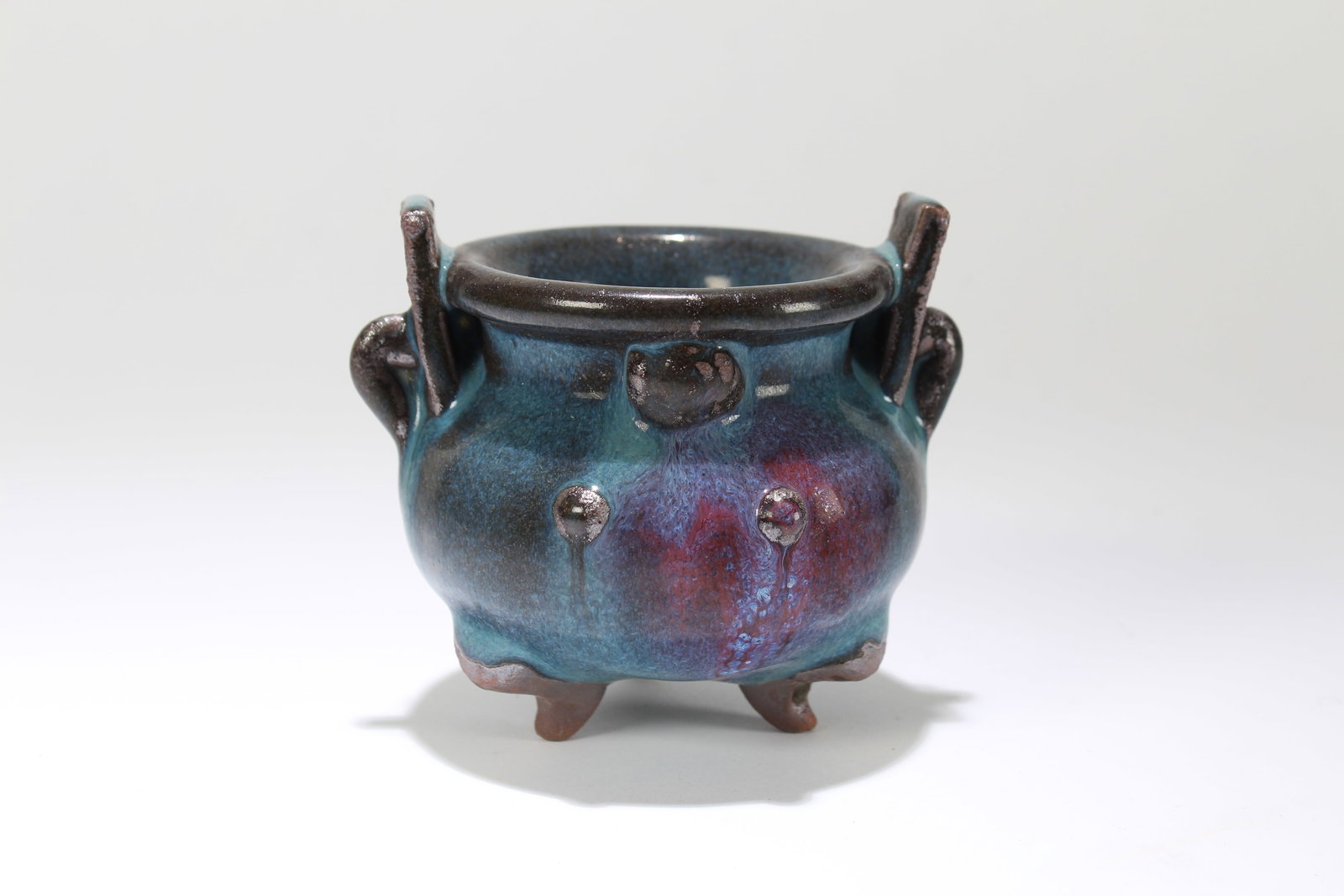 A Chinese Tri-podded Fortune Porcelain Censer: A Chinese Tri-podded Fortune Porcelain Censer. Height: 3.75 (inch). Width: 3.75 (inch).