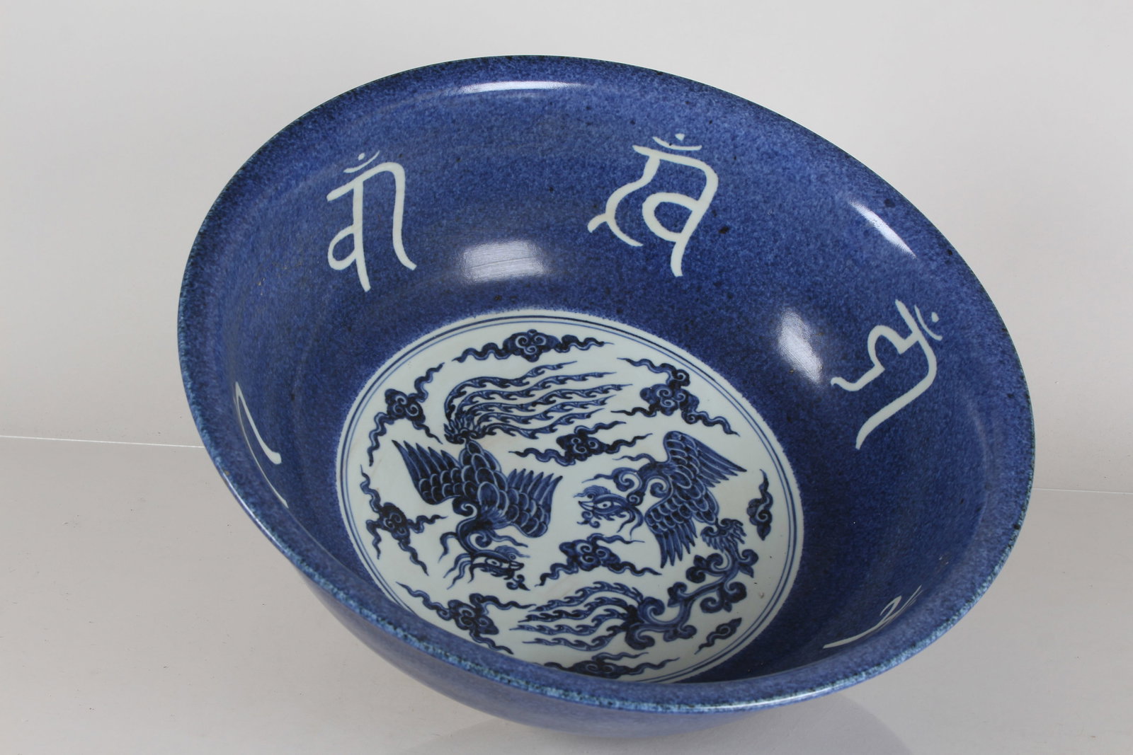 A Chinese Ancient-framing Phoenix-fortune Blue-coding Massive Porcelain Plate: A Chinese Ancient-framing Phoenix-fortune Blue-coding Massive Porcelain Plate. Height: 6 (inch). Opening Diameter: 16.5 (inch).