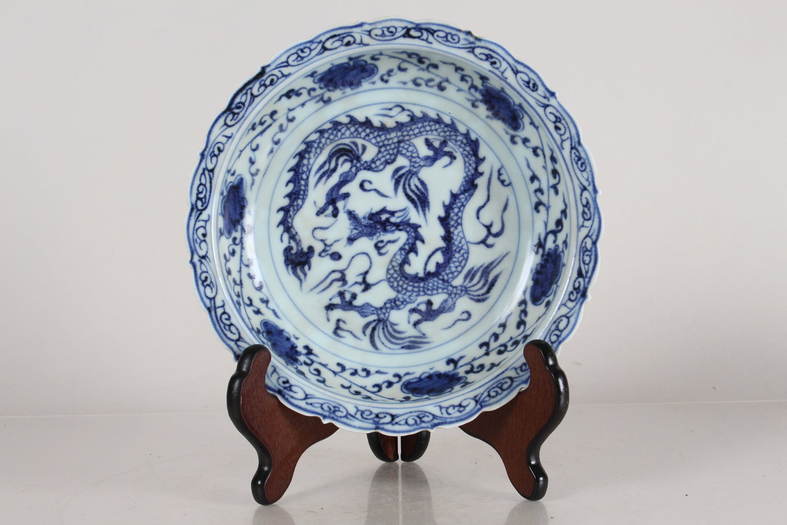 A Chinese Blue and White Dragon-decorating Porcelain Fortune Plate: A Chinese Blue and White Dragon-decorating Porcelain Fortune Plate. Opening Diameter: 8.75 (inch).