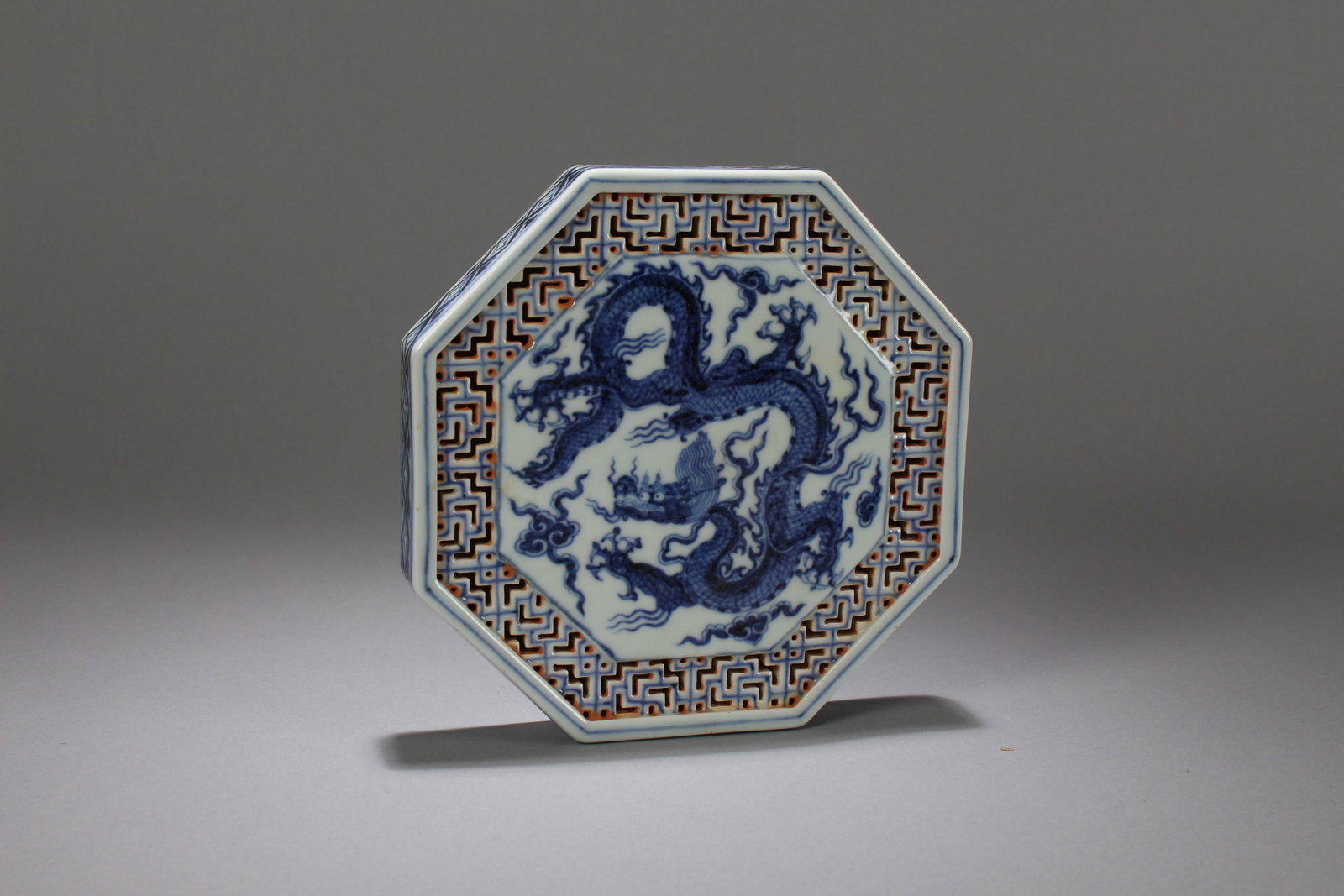 A Chinese Octa-fortune Dragon-decorating Porcelain Fortune Plate: A Chinese Octa-fortune Dragon-decorating Porcelain Fortune Plate. Height: 1 (inch). Length: 6.75 (inch). Width: 6.75 (inch).