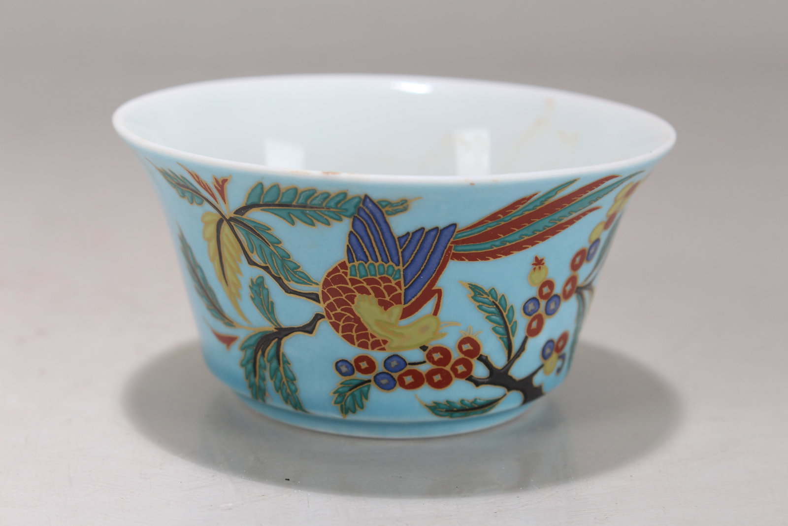 A Chinese Circular Ancient-framing Porcelain Fortune Cup: A Chinese Circular Ancient-framing Porcelain Fortune Cup. Height: 1.75 (inch). Opening Diameter: 3.25 (inch).
