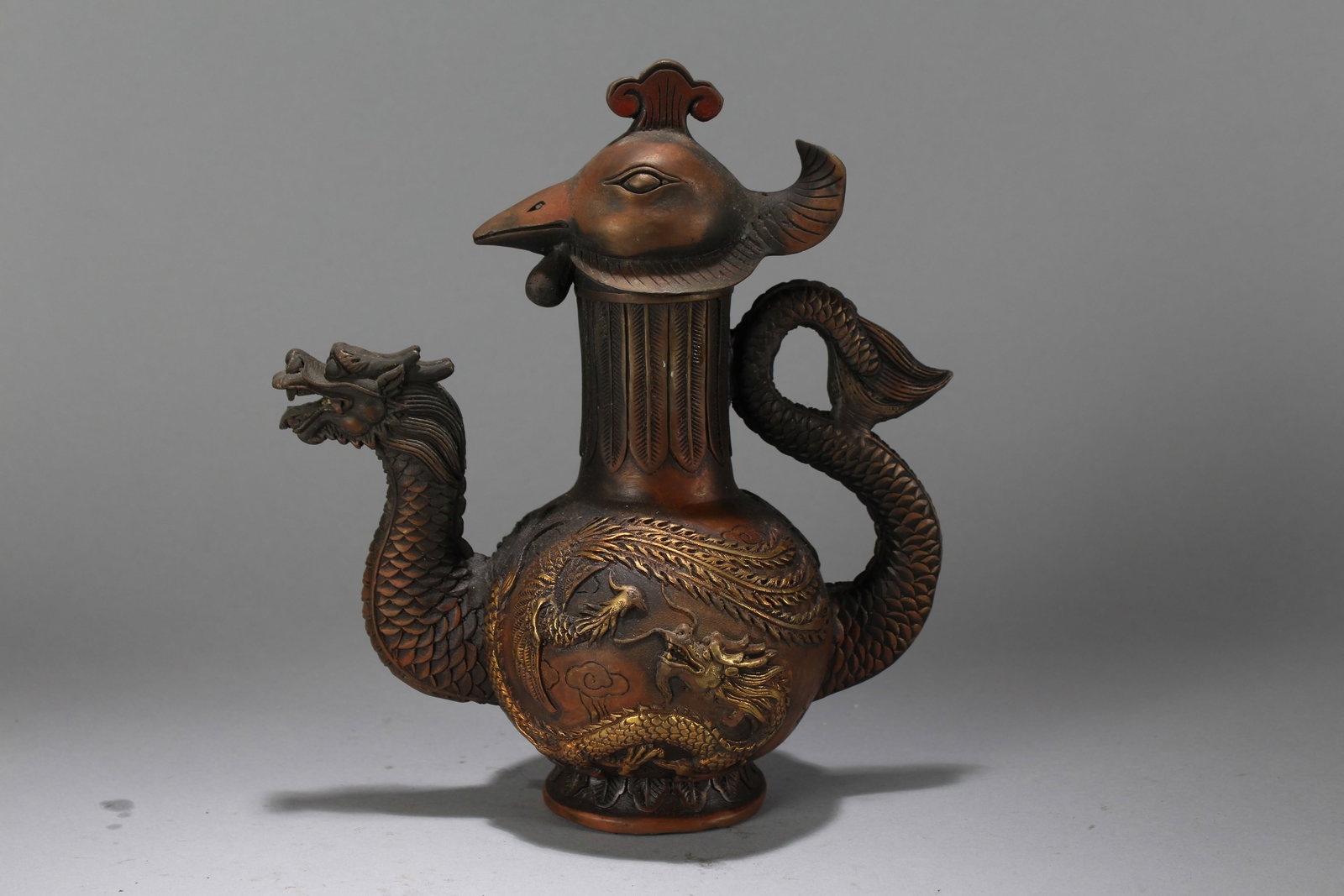A Chinese Dragon-decorating Religious Ewer: A Chinese Dragon-decorating Religious Ewer. Height : 9 (inch). Width : 8 (inch). Length : 4.5 (inch).