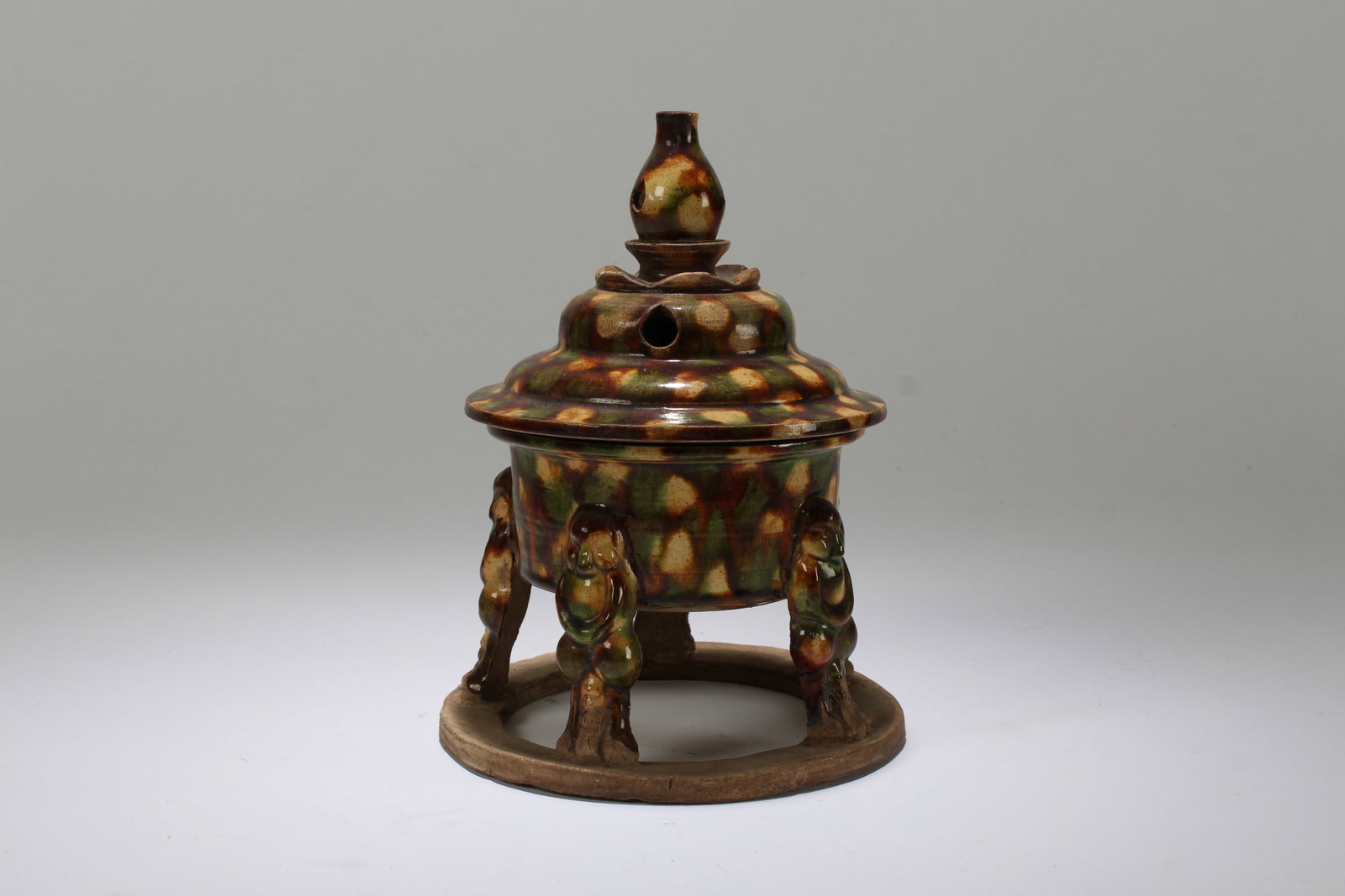 A Chinese Lidded Tr-colored Porcelain Censer: A Chinese Lidded Tr-colored Porcelain Censer. Height: 7 (inch). Length: 4.5 (inch).