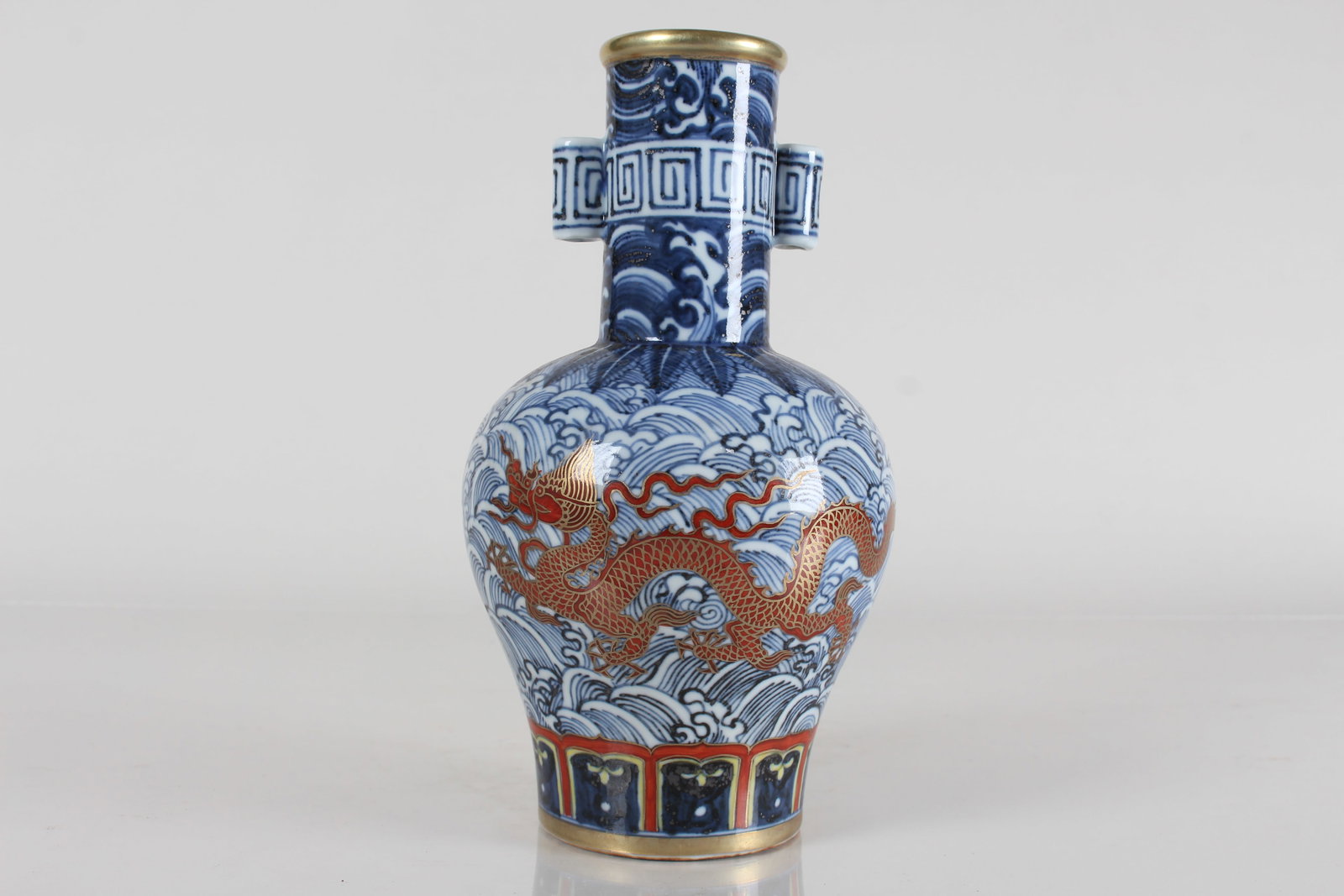 A Chinese Duo-handled Detailed Dragon-decorating Porcelain Fortune Vase: A Chinese Duo-handled Detailed Dragon-decorating Porcelain Fortune Vase . Height: 8 (inch).