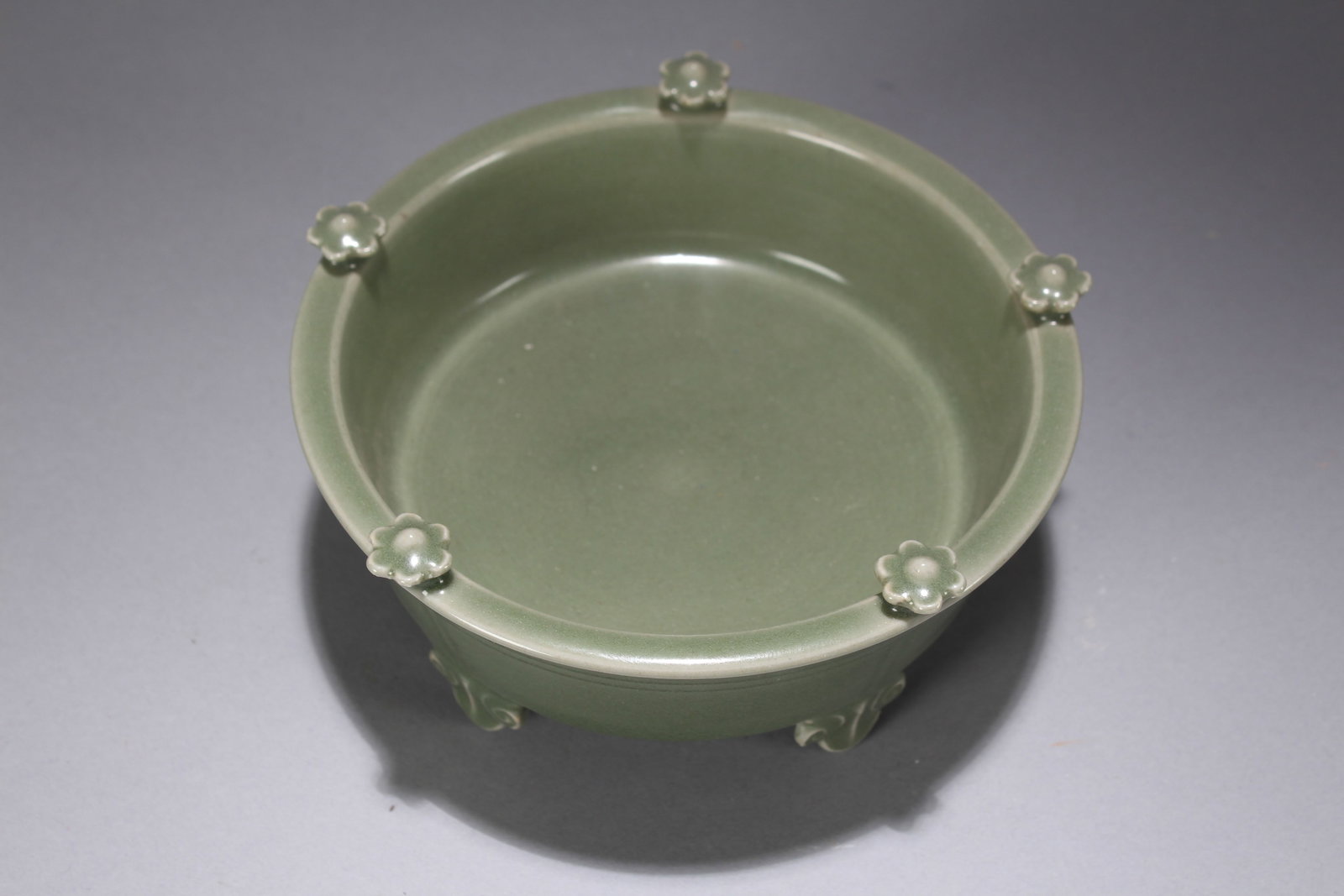 A Chinese Vividly-detailed Tri-podded Porcelain Fortune Censer: A Chinese Vividly-detailed Tri-podded Porcelain Fortune Censer. Height: 2.75 (inch). Width: 6.25 (inch).