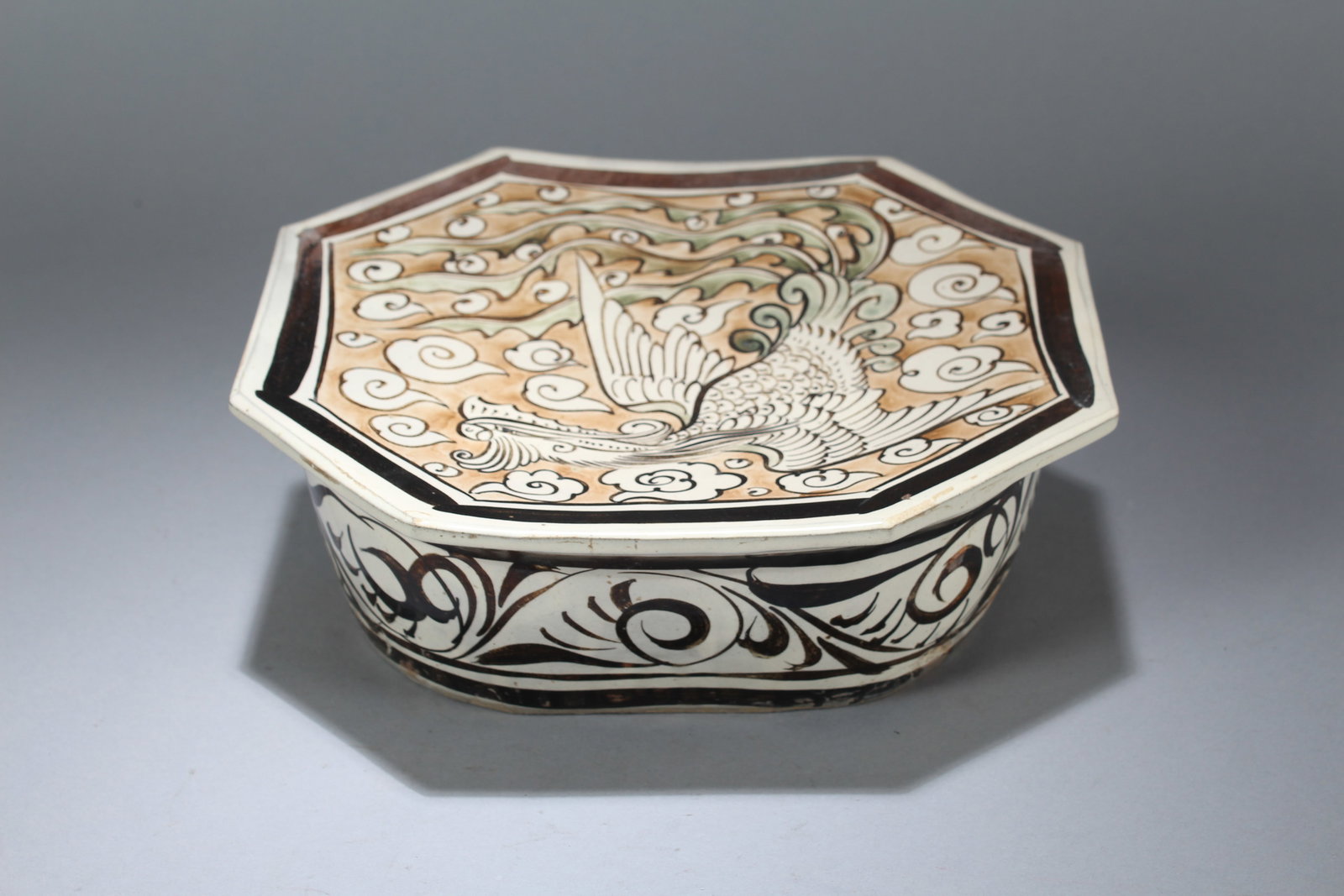 A Chinese Religious Phoenix-decorating Porcelain Fortune Statue: A Chinese Religious Phoenix-decorating Porcelain Fortune Statue. Height: 3.25 (inch). Width: 10 (inch). Length: 9 (inch).