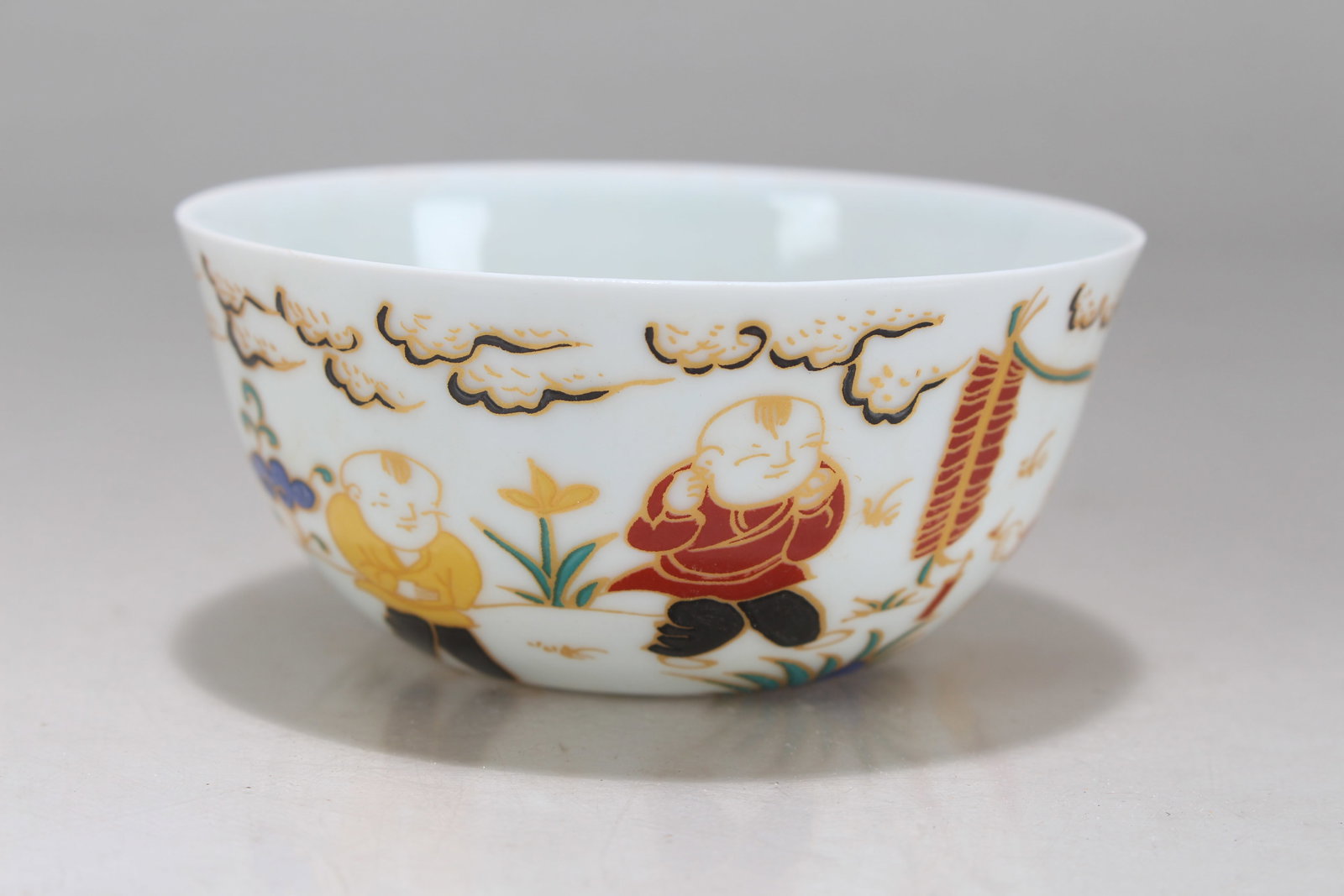 A Chinese Circular Ancient-framing Porcelain Fortune Cup: A Chinese Circular Ancient-framing Porcelain Fortune Cup. Height: 1.5 (inch). Opening Diameter: 3.25 (inch).