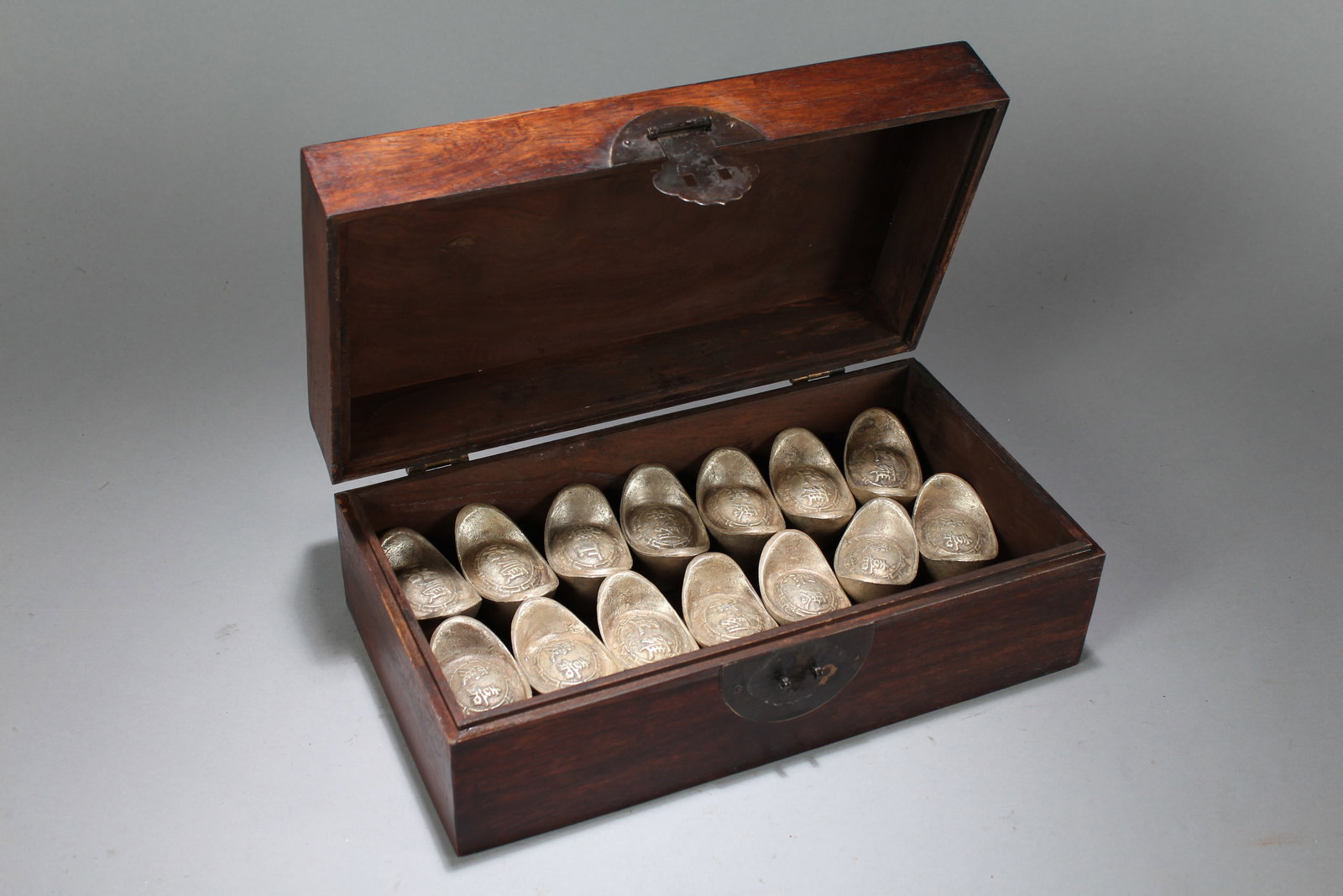 A Chinese Moneybrick-filled Lidded Box: A Chinese Moneybrick-filled Lidded Box. Height: 4.25 (inch). Width: 12 (inch). Length: 6.5 (inch)
