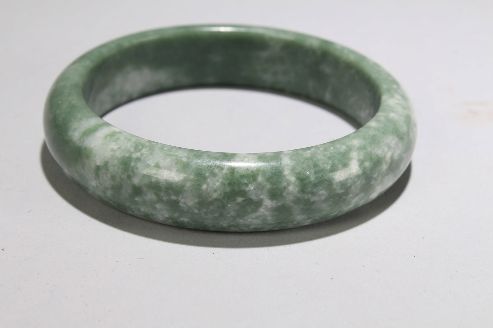A Chinese Bangel Display: A Chinese Bangel Display . Opening Diameter: 3 (inch).