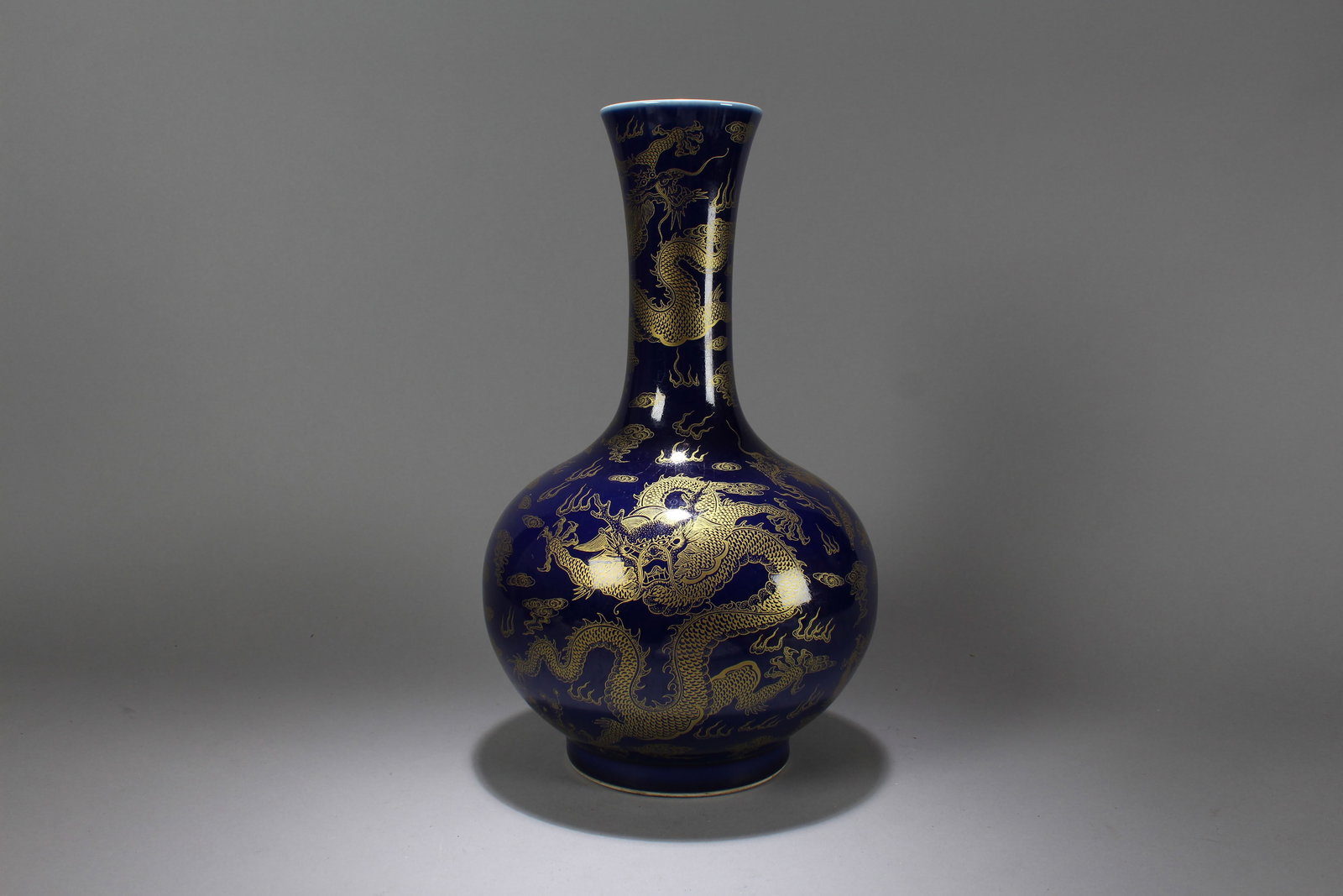 A Chinese Dragon-decorating Blue-coding Porcelain Vase: A Chinese Dragon-decorating Blue-coding Porcelain Vase. Height: 15.5 (inch). Opening Diameter: 9 (inch)