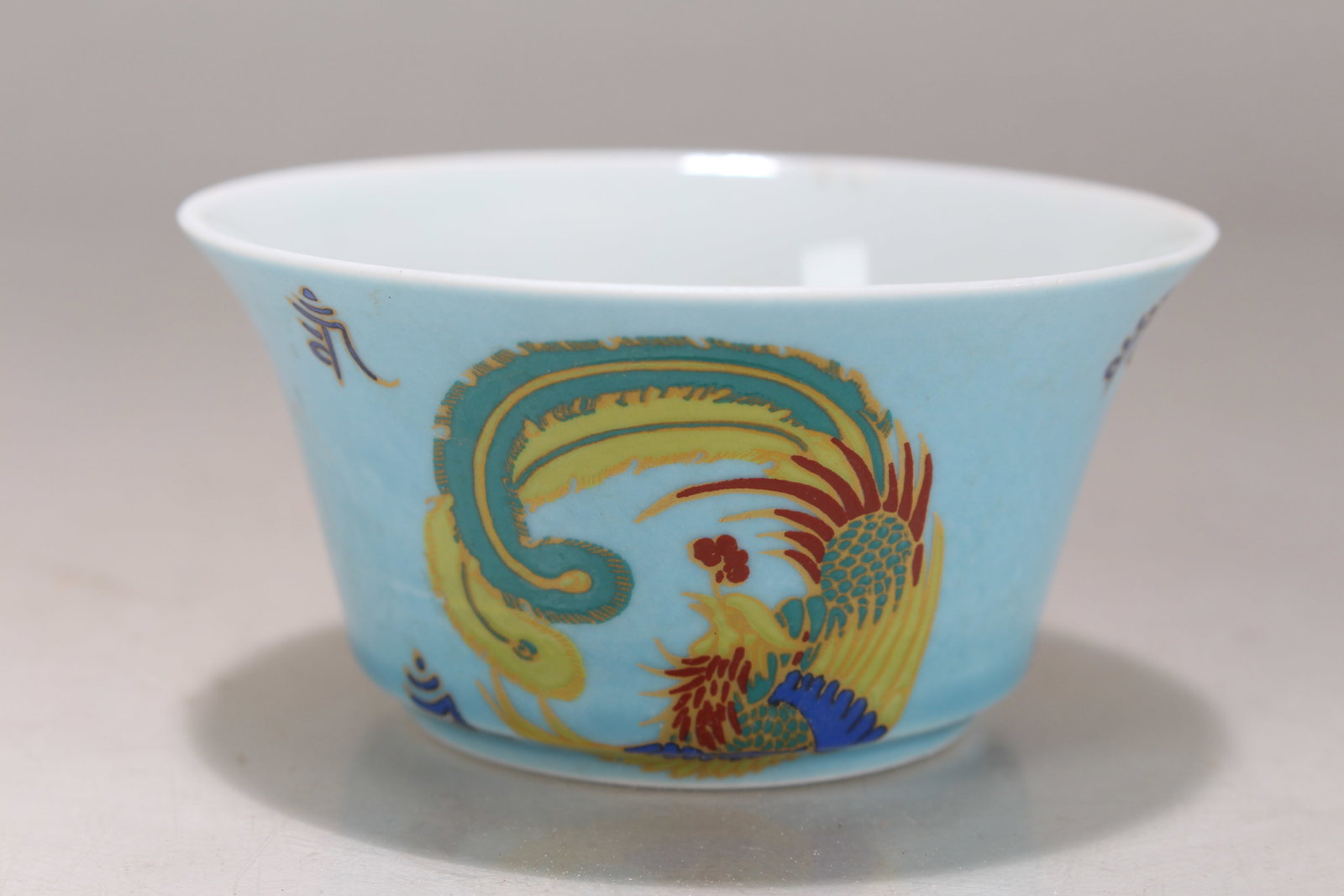 A Chinese Circular Ancient-framing Porcelain Fortune Cup: A Chinese Circular Ancient-framing Porcelain Fortune Cup. Height: 1.5 (inch). Opening Diameter: 3.25 (inch).