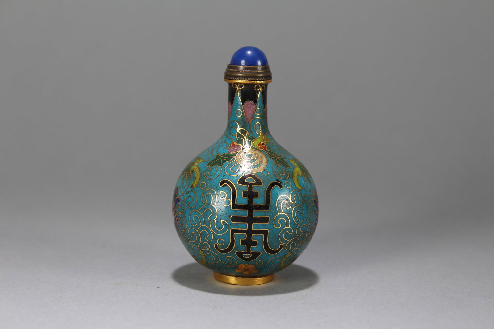 A Chinese Bat-framing Religious Fortune Snuff Bottle: A Chinese Bat-framing Religious Fortune Snuff Bottle. Height : 3.5 (inch). Opening Diameter : 2 (inch).