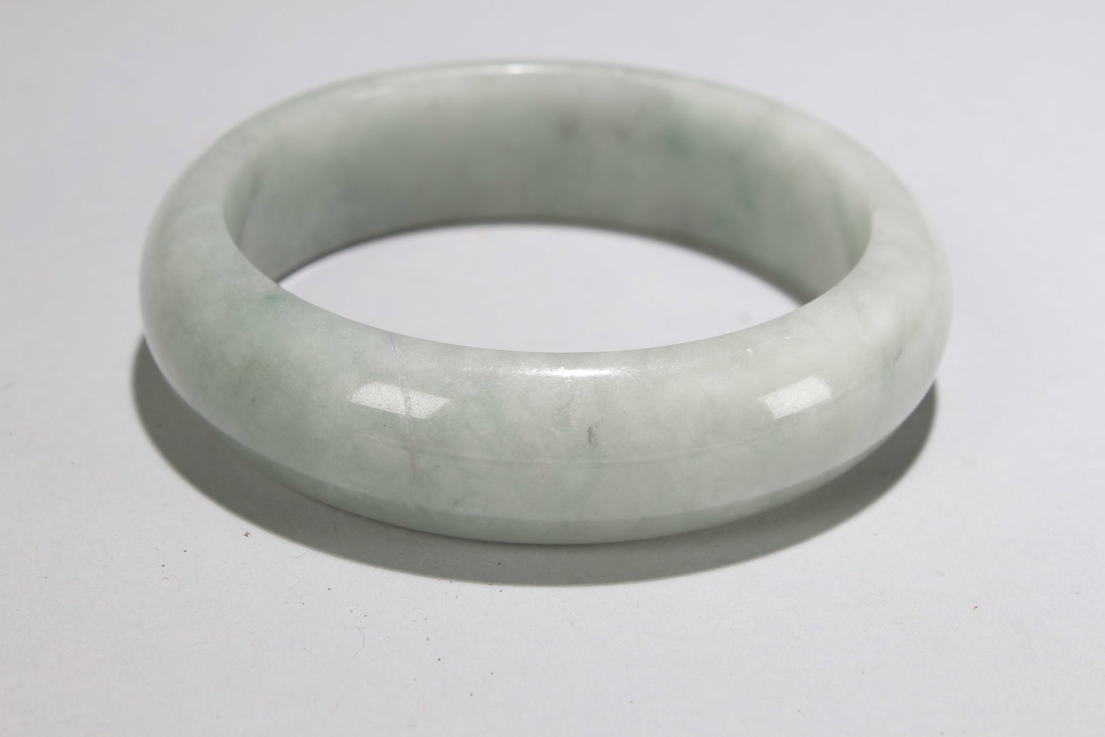A Chinese Bangel Display: A Chinese Bangel Display . Opening Diameter: 3 (inch).