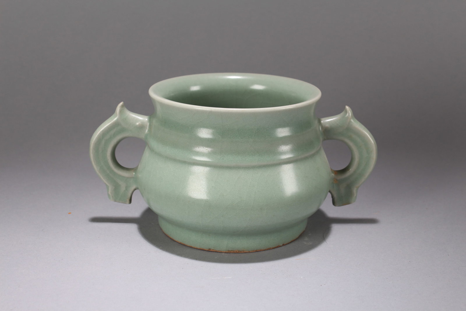 A Chinese Vividly-detailed Duo-handling Superior Porcelain Censer: A Chinese Vividly-detailed Duo-handling Superior Porcelain Censer. Height: 4 (inch). Width: 7.75 (inch).