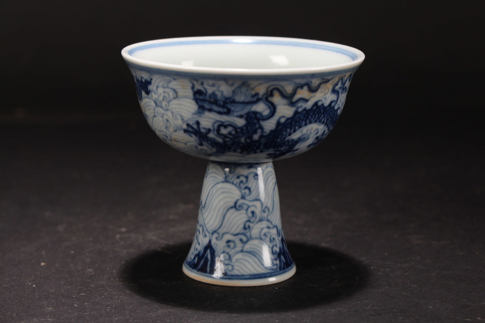 A Chinese Phoenix Porcelain Fortune Cup: A Chinese Phoenix Porcelain Fortune Cup. Height: 3.5 (inch). Opening Diameter: 3.5 (inch).
